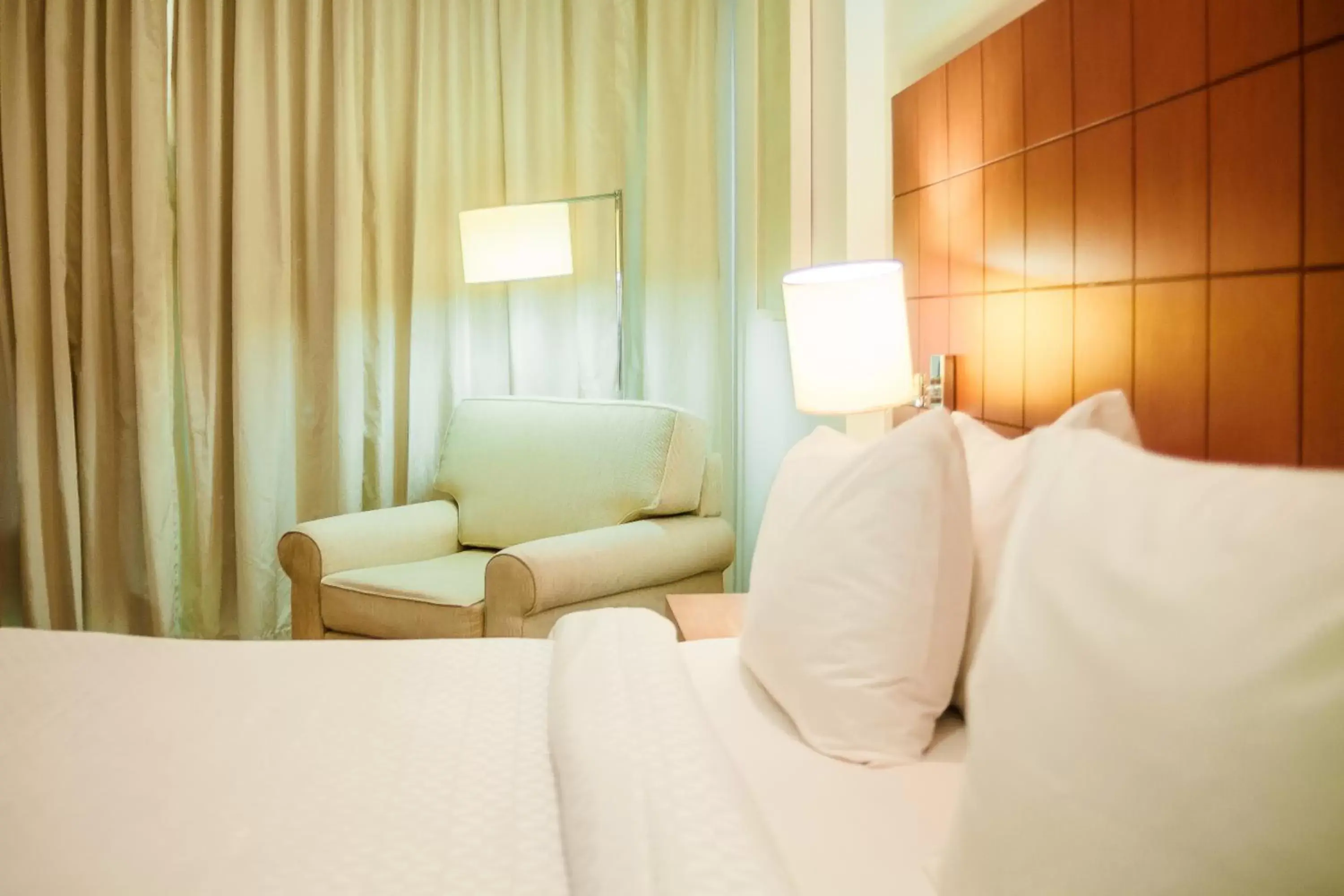 Bed in Mercure Macaé Bed in Mercure Macaé