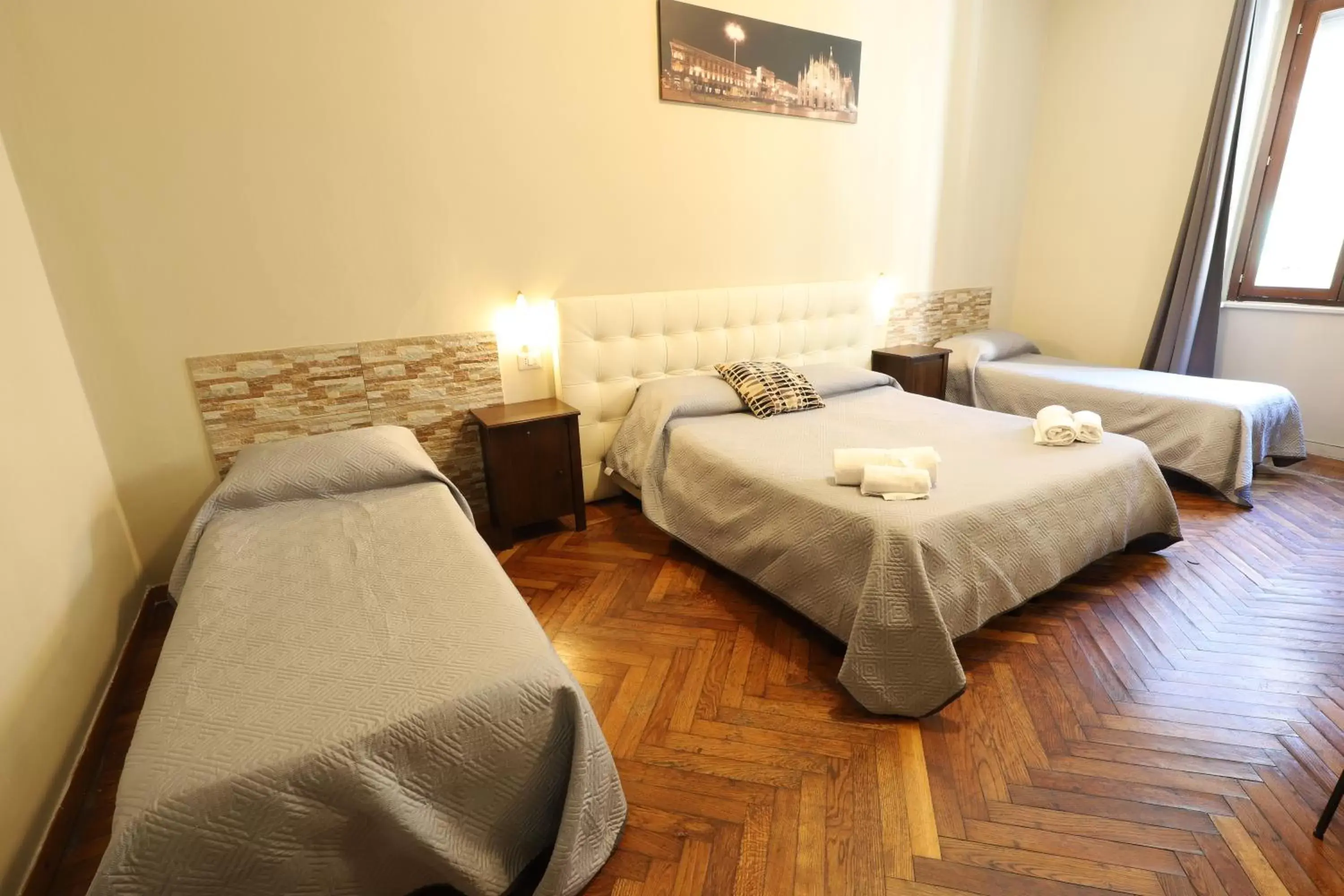 Bed in Carlo Goldoni Hotel