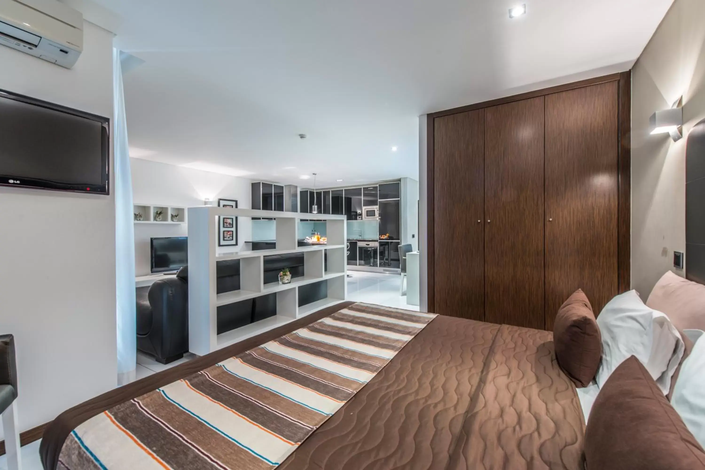 Bed in RK Suite Hotel Bed in RK Suite Hotel