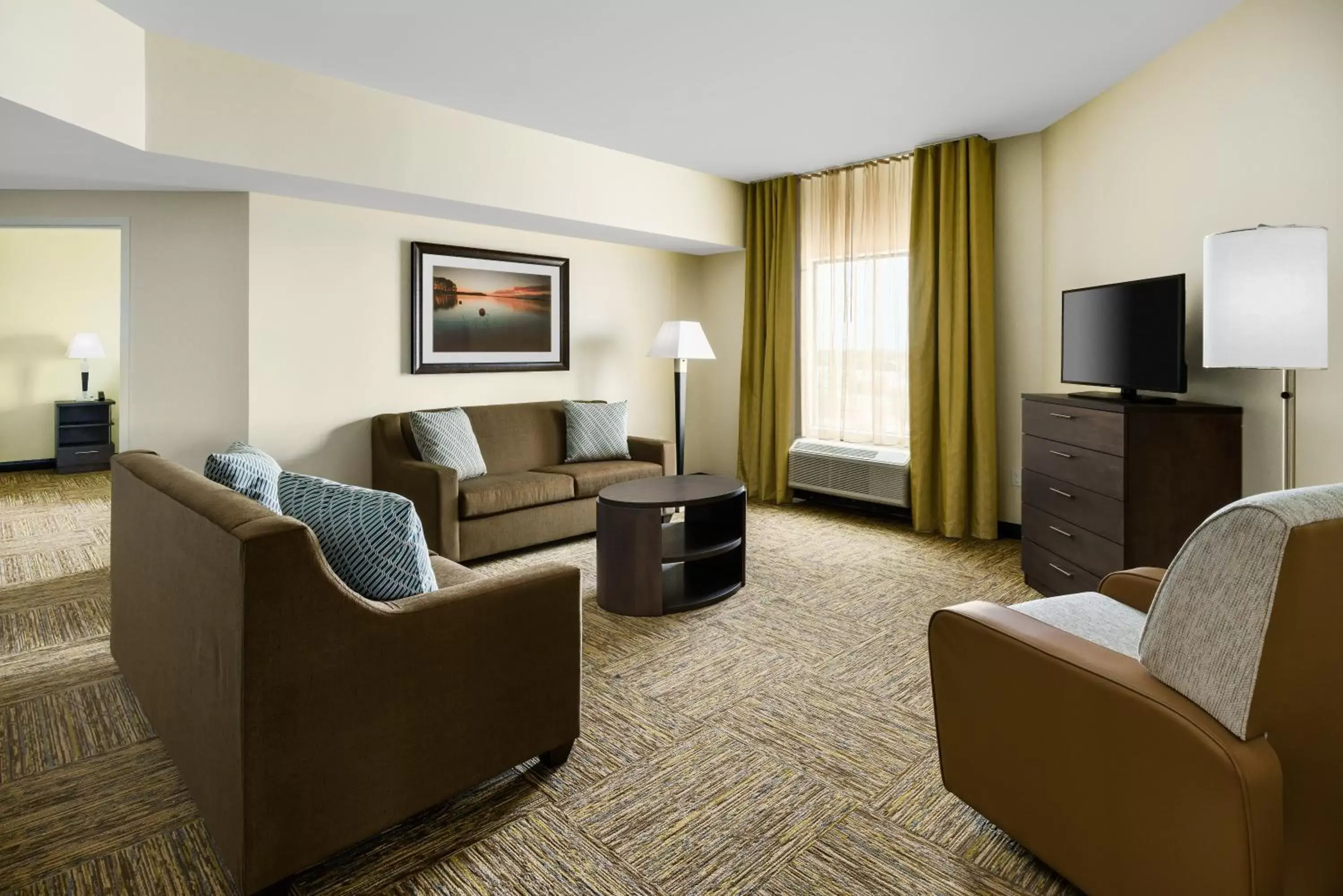Living room, Seating Area in Candlewood Suites - Orlando - Lake Buena Vista, an IHG Hotel