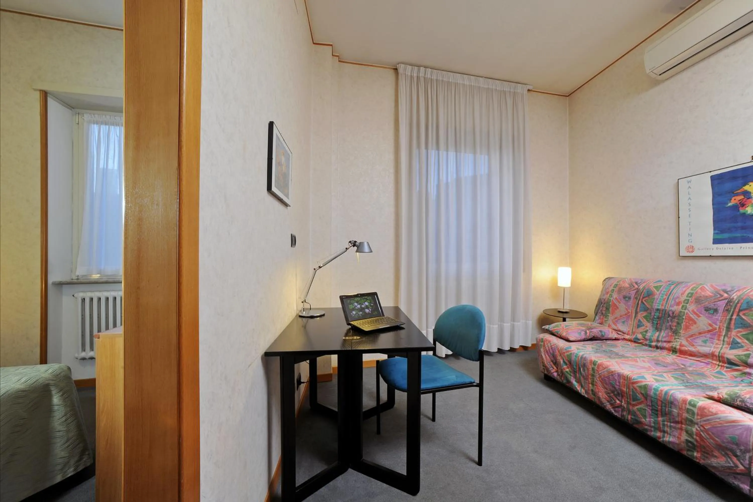 Living room, Bed in Tuscia Hotel