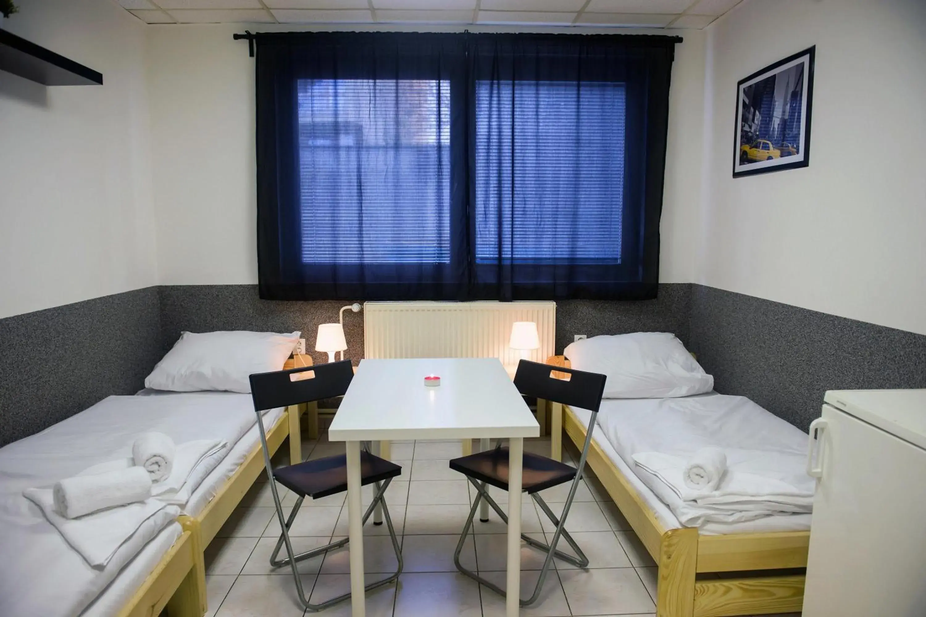 Bed, Seating Area in Hostel Seven