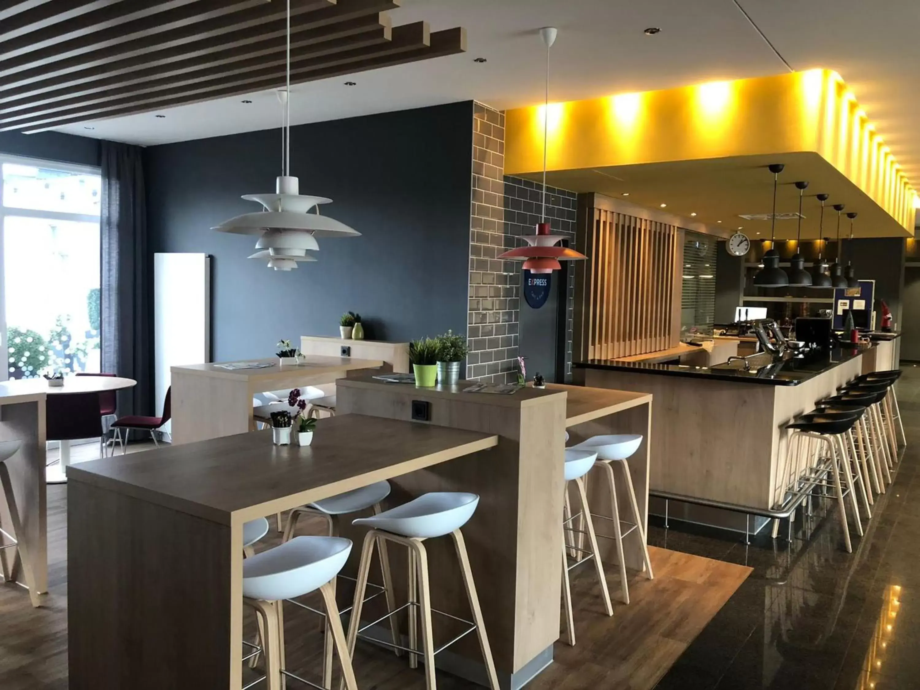 Property building, Kitchen/Kitchenette in Holiday Inn Express Frankfurt Messe, an IHG Hotel