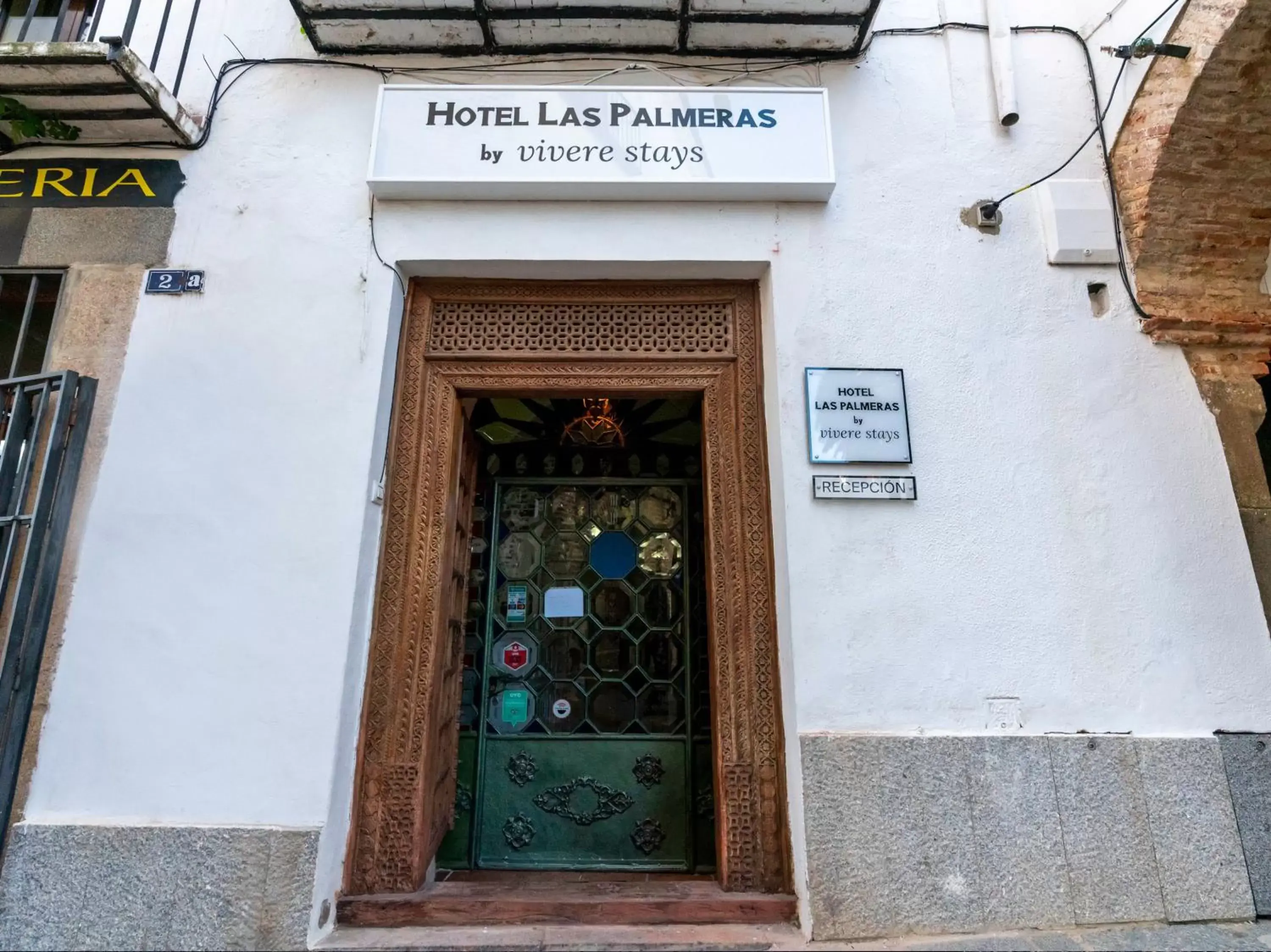 Property building in Hotel Las Palmeras by Vivere Stays