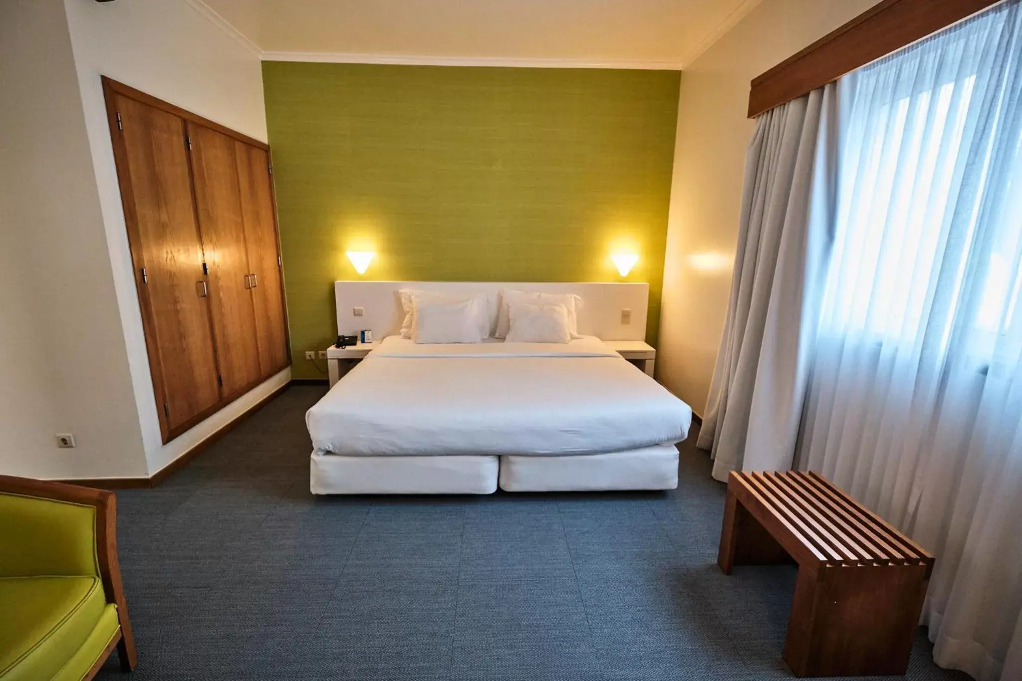 Bed in Hotel Varandas do Atlântico by RIDAN Hotels Bed in Hotel Varandas do Atlântico by RIDAN Hotels