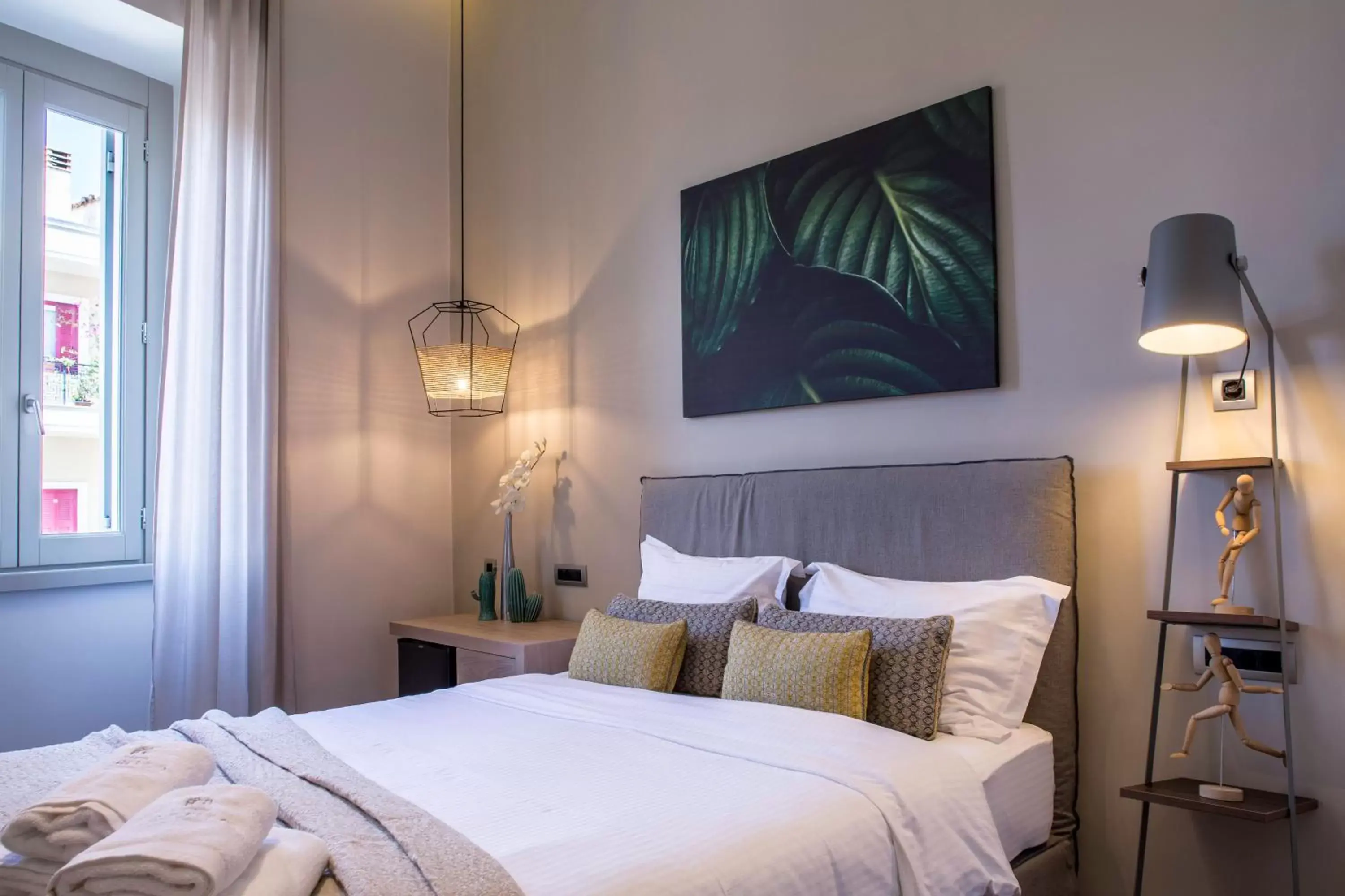 Bed in Gambello Luxury Rooms