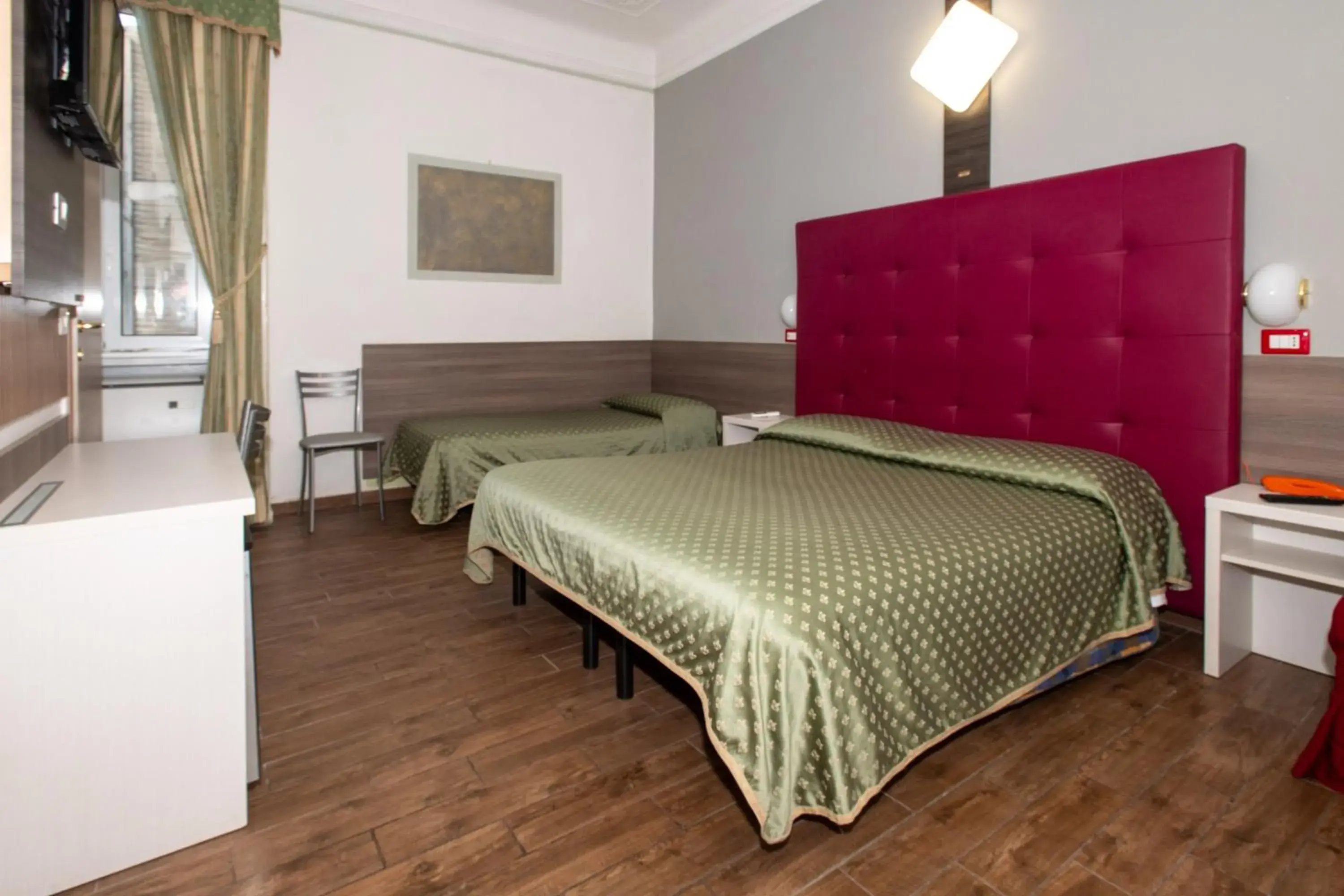 Bed in Hotel Piola