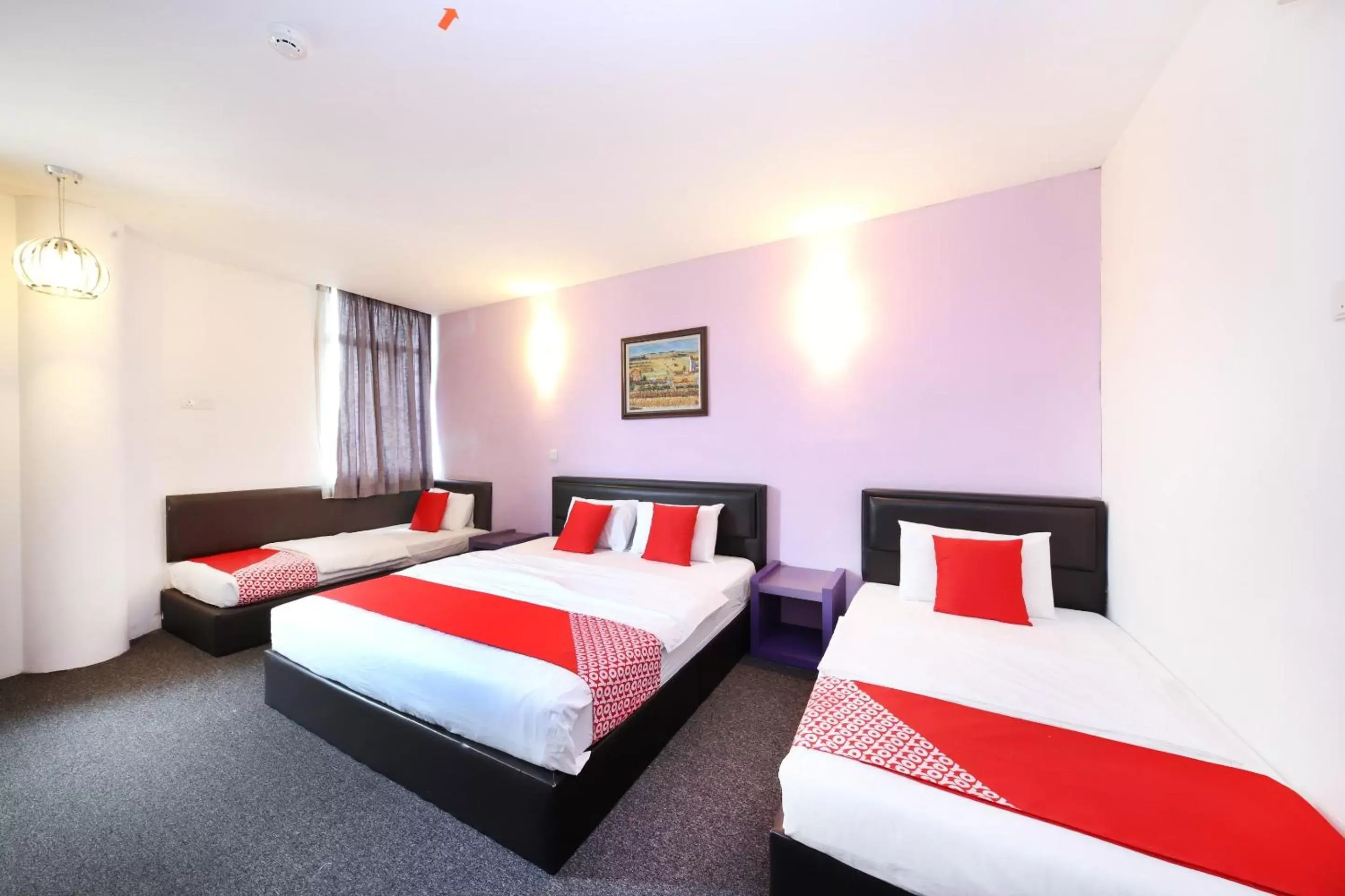 Bedroom in OYO 442 Marvelton Hotel