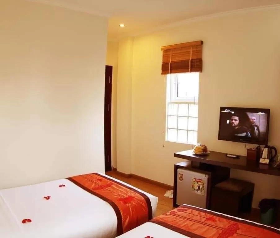Property building, Bed in Rising Dragon Hotel