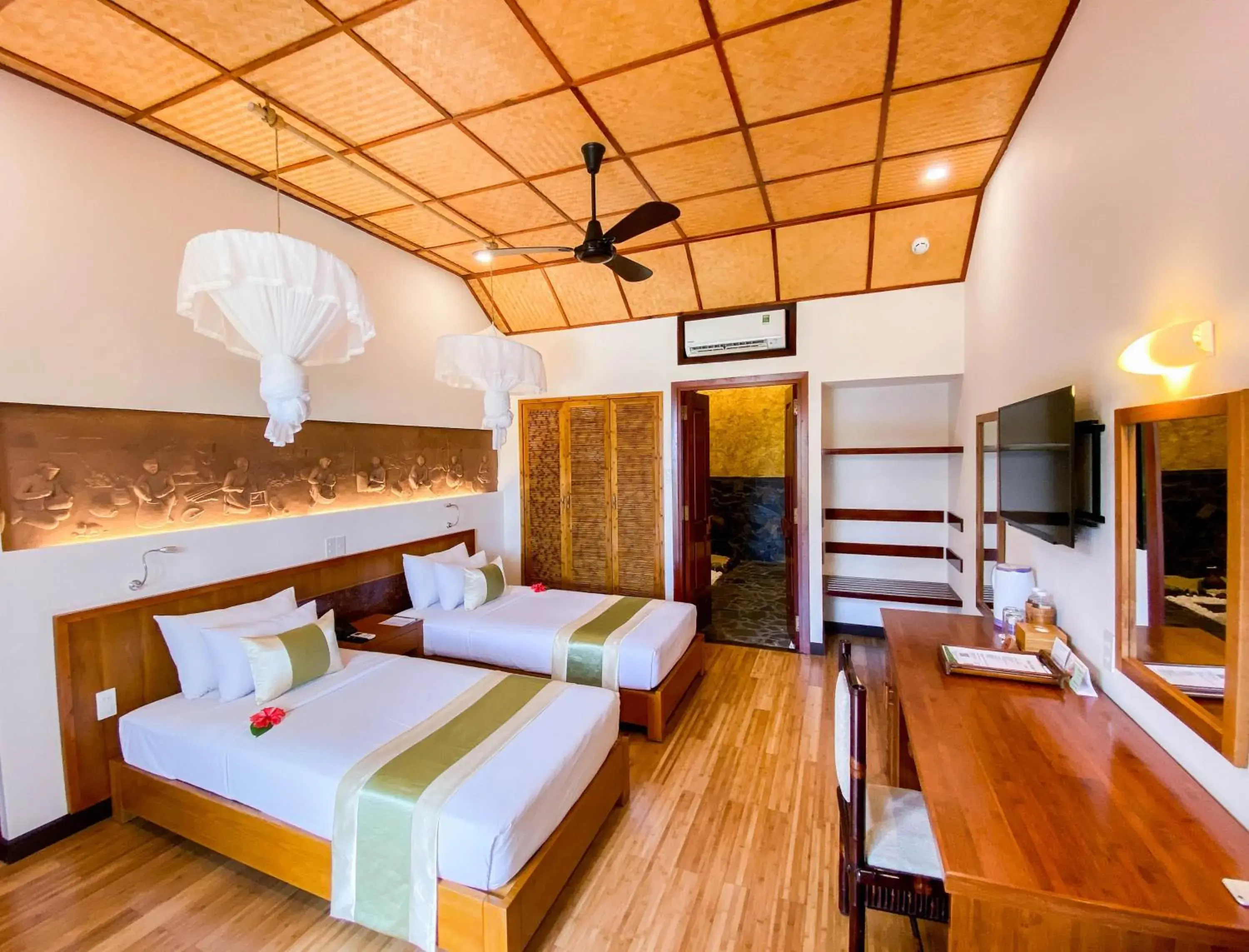 Bed in Bamboo Village Beach Resort & Spa