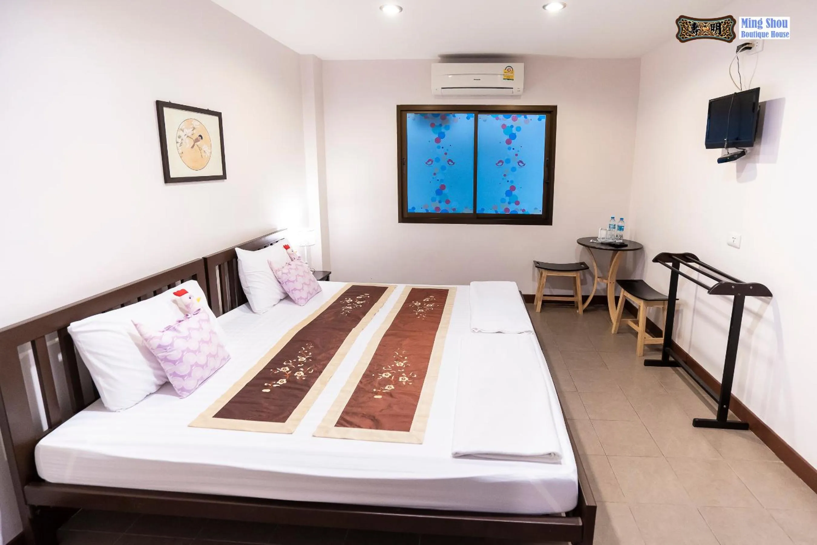 Bed in Ming Shou Boutique House