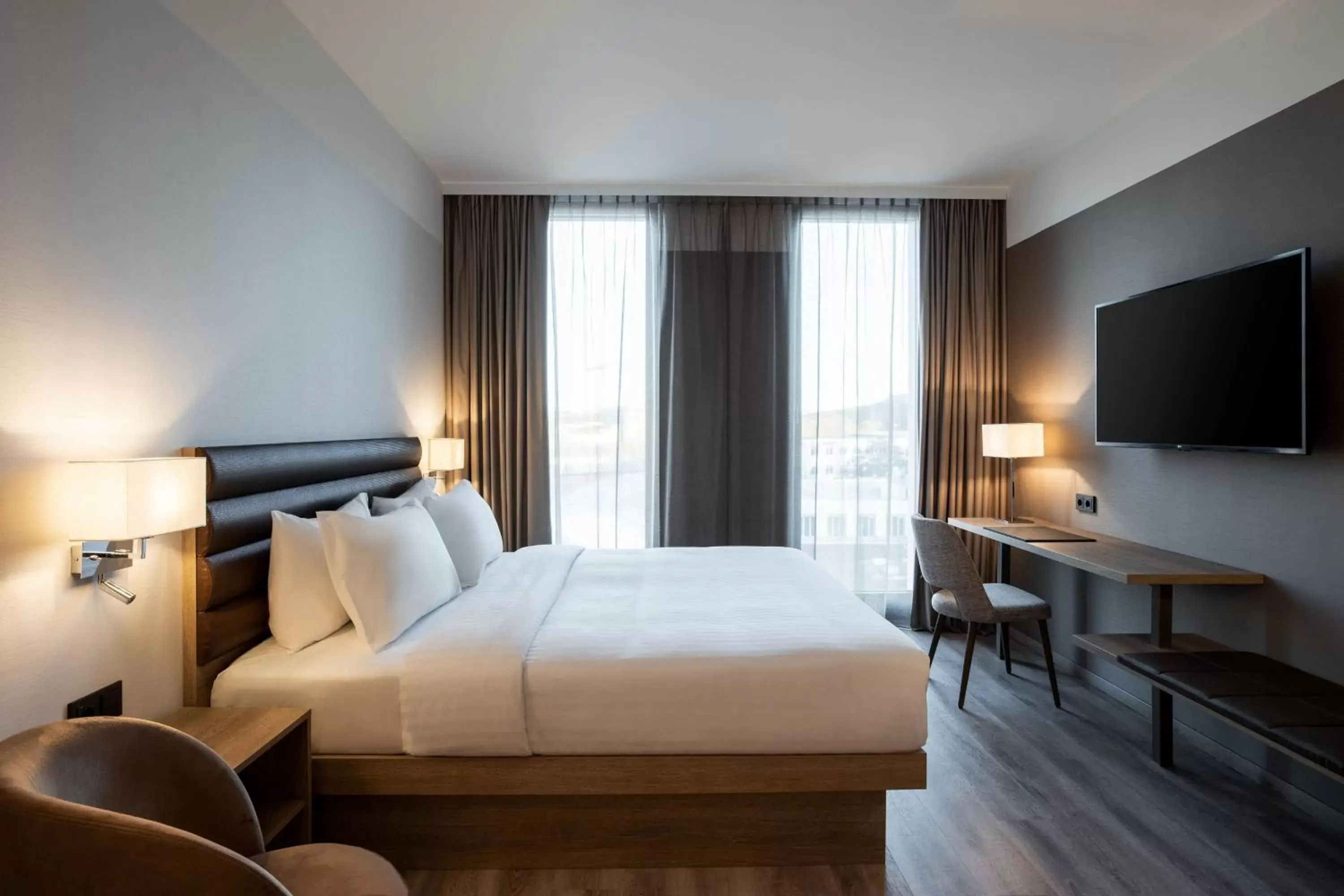 Photo of the whole room, Bed in AC Hotel by Marriott Wuerzburg