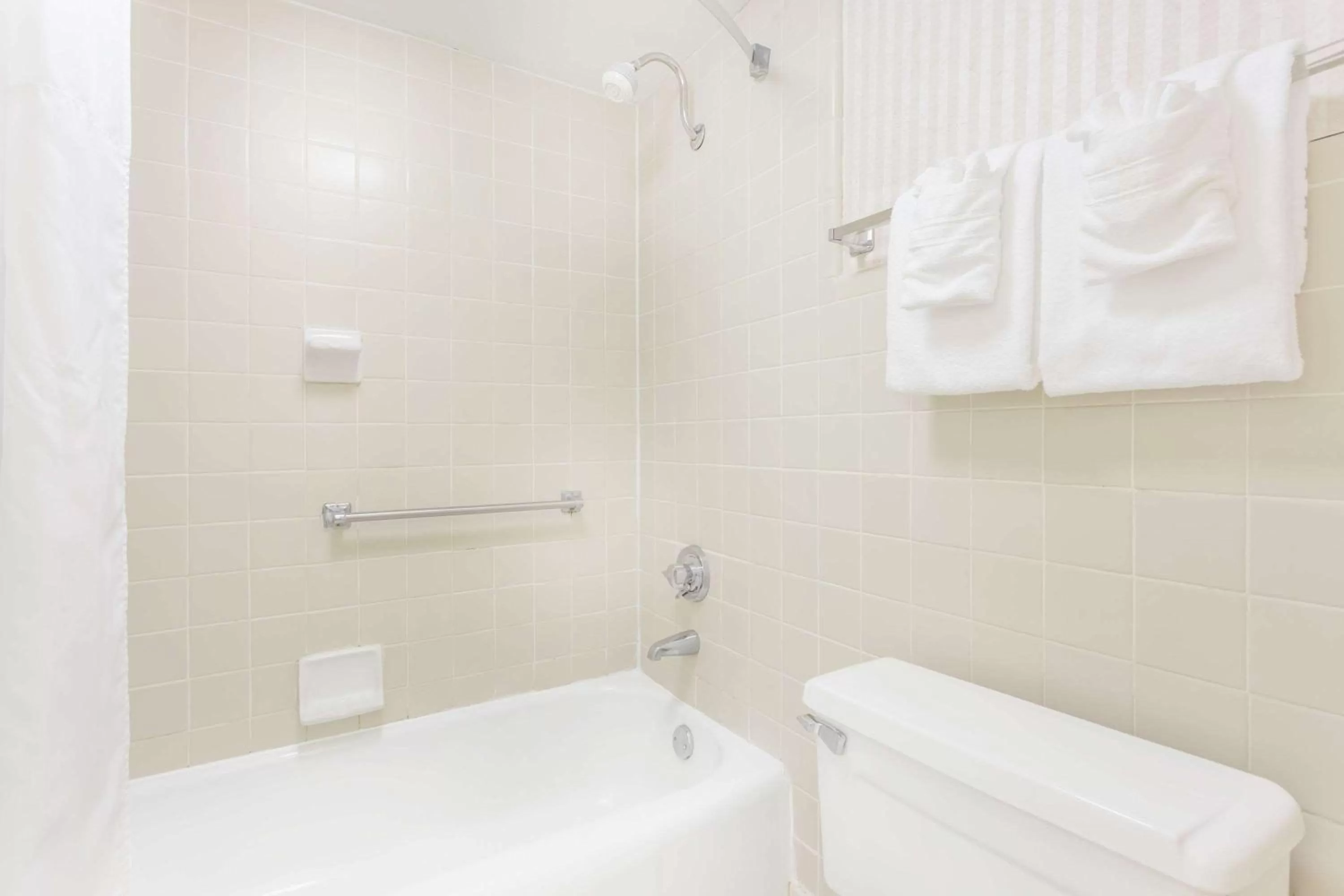 Bathroom in Days Inn by Wyndham Cedar Falls- University Plaza