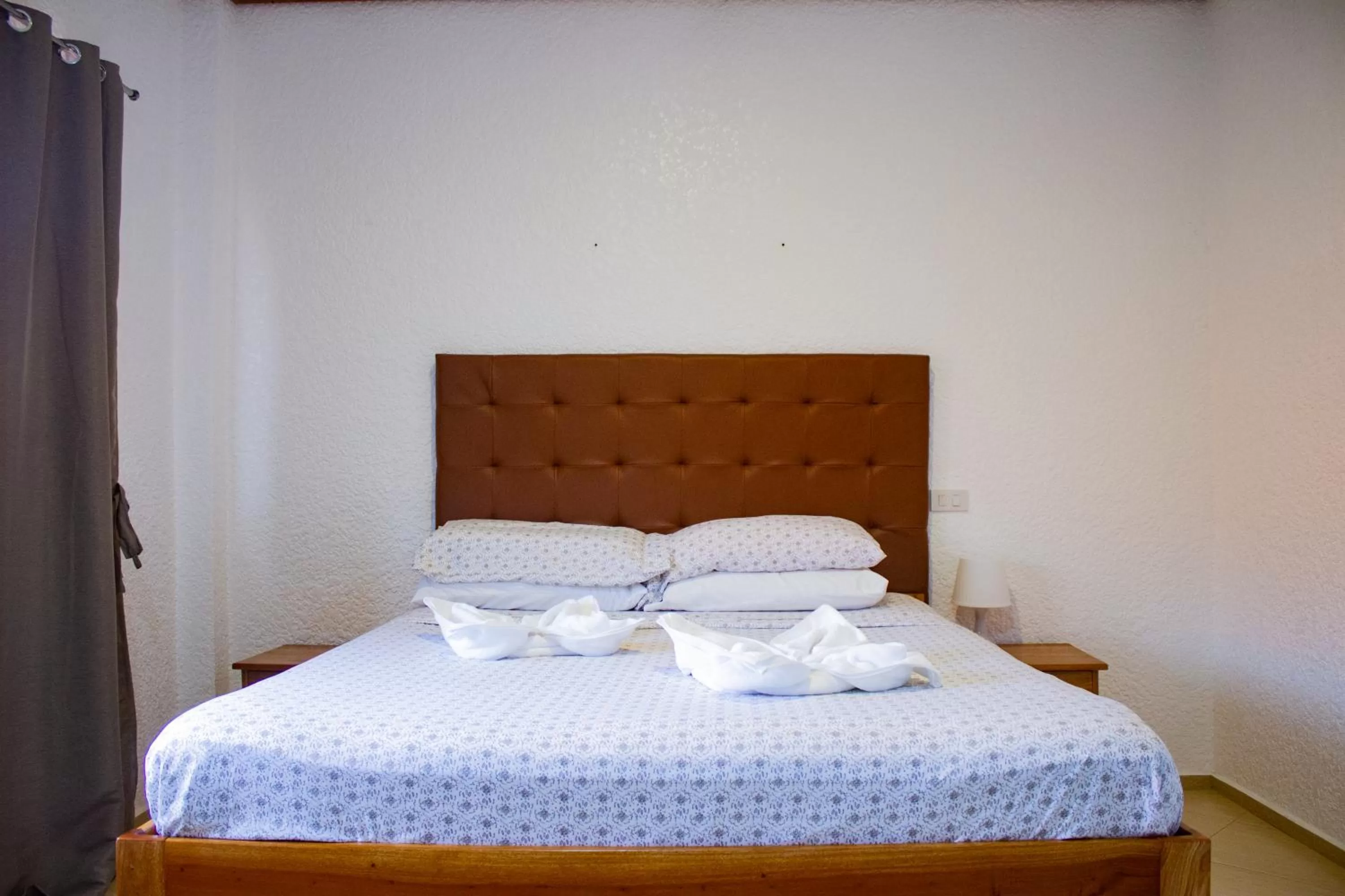 Bed in Jugalis Hotel and Restaurant