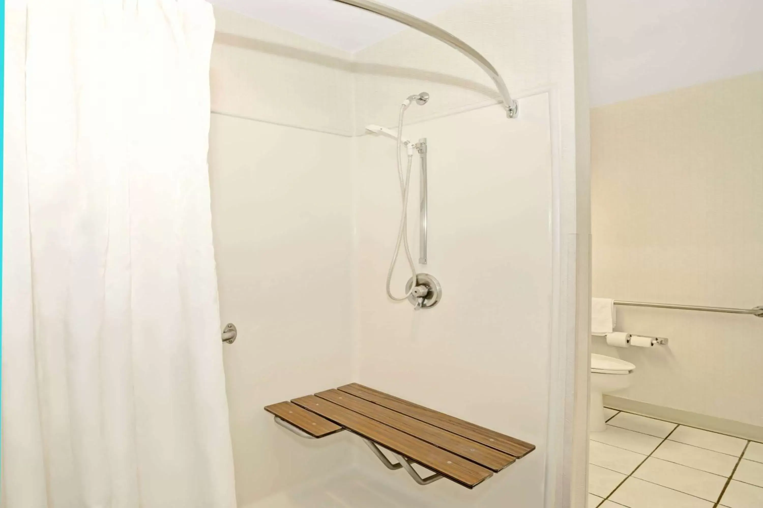 Bathroom in Microtel Inn by Wyndham Raleigh-Durham Airport