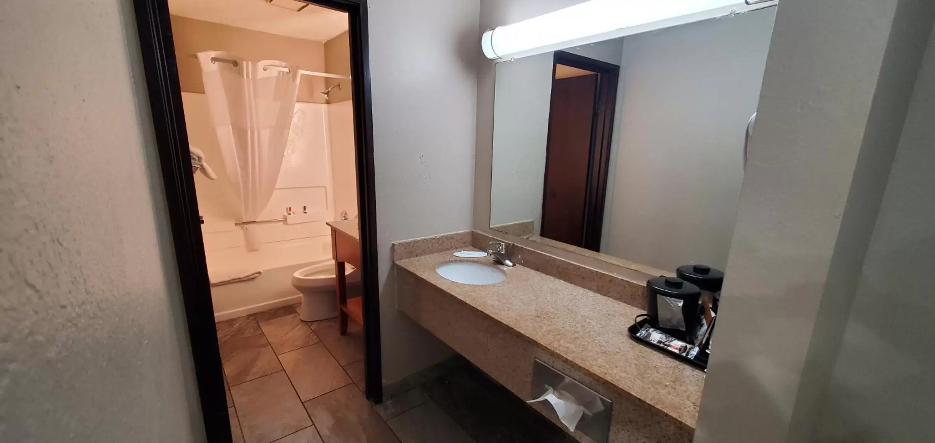 Bathroom in Super 8 by Wyndham Sterling Heights/Detroit Area