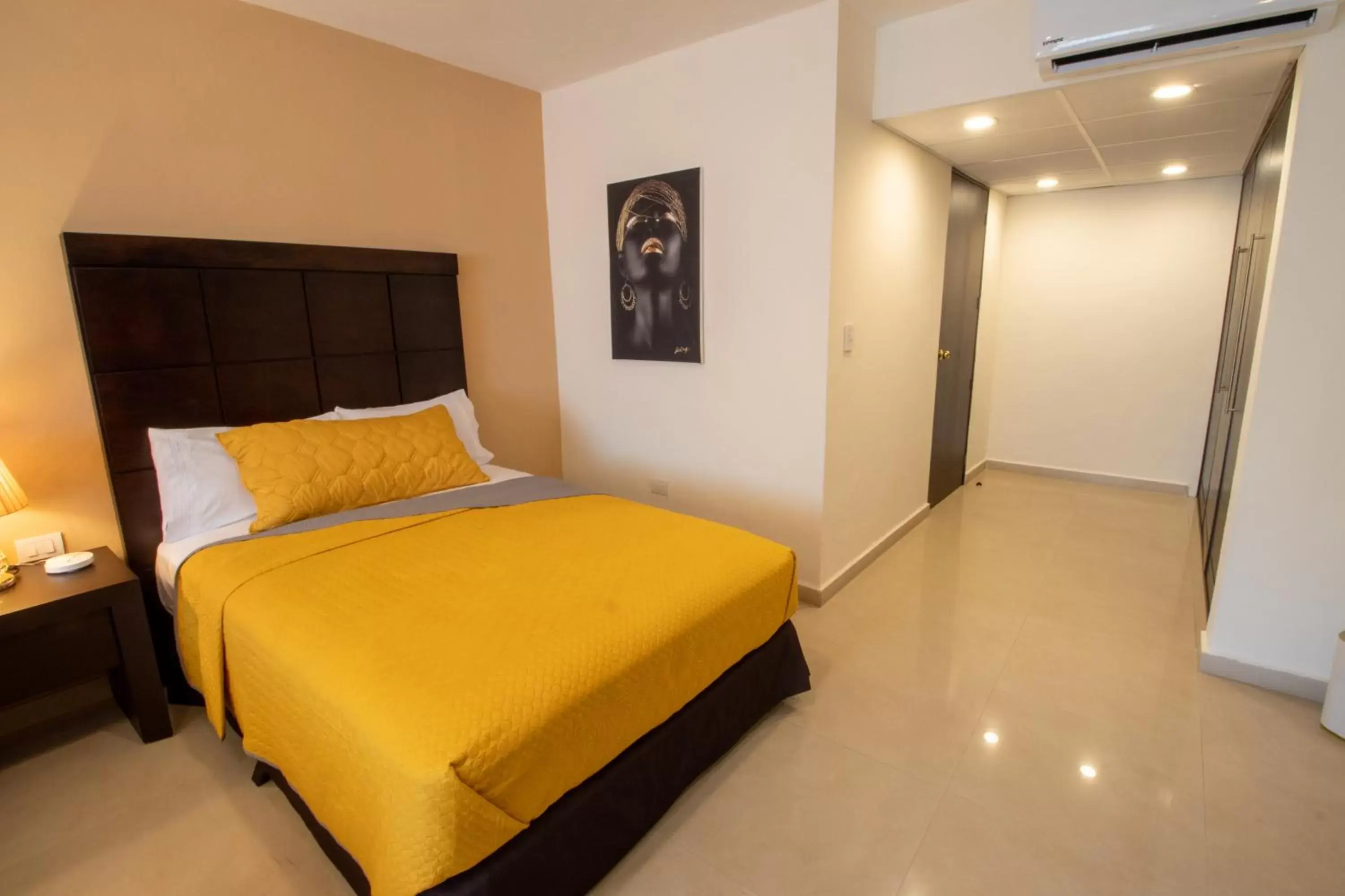 Bed in Hotel Villas Segovia Suites Playa del Carmen