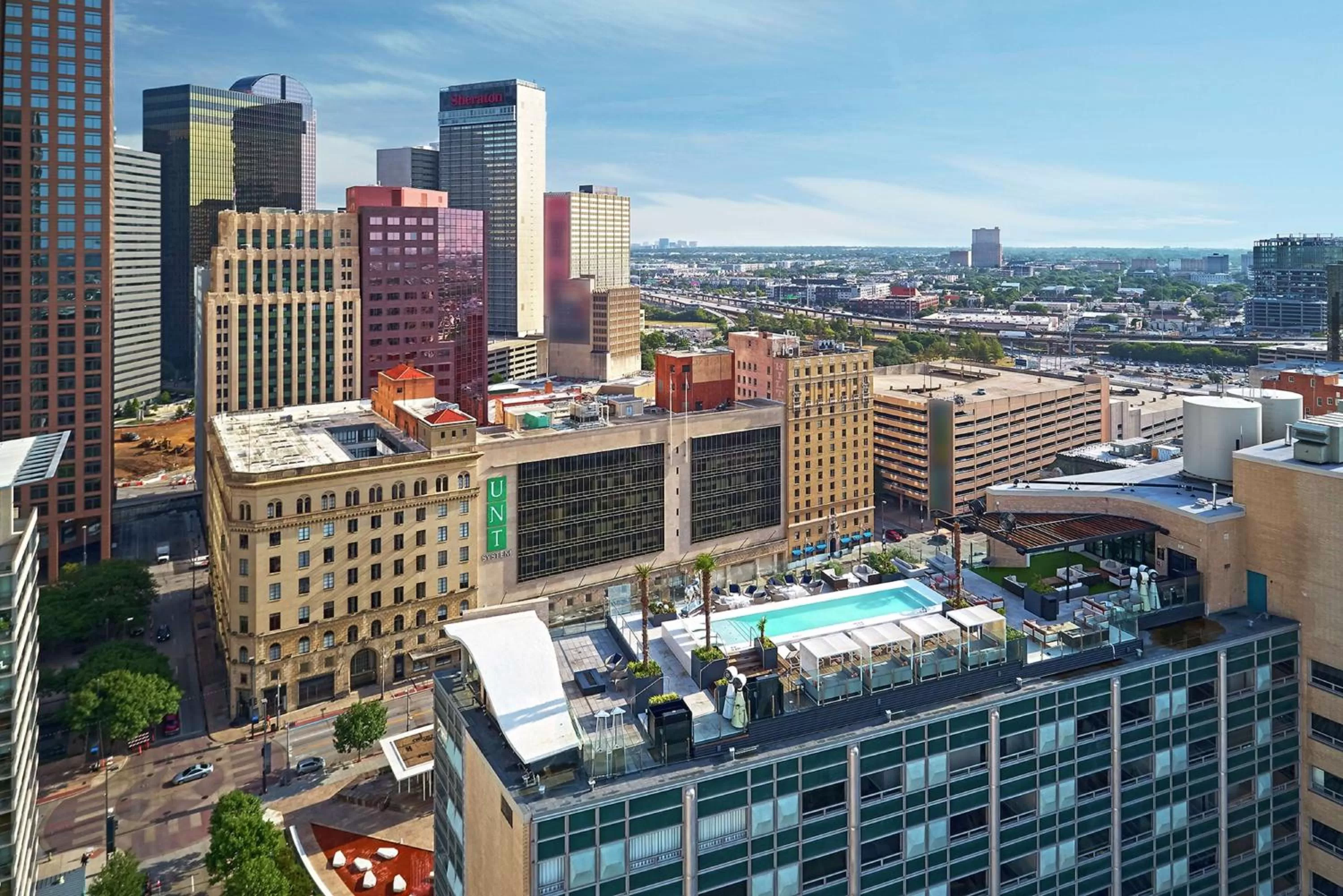 Pool view in The Statler Dallas, Curio Collection By Hilton