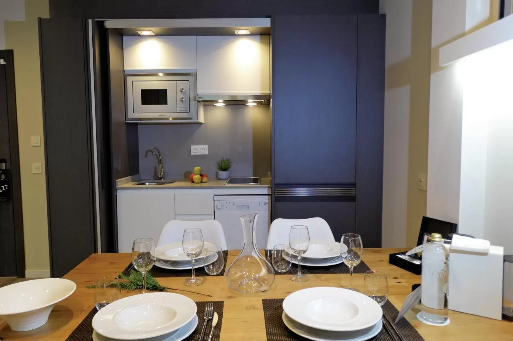 Kitchen or kitchenette, Dining Area in Bilbao City Center by abba Suites