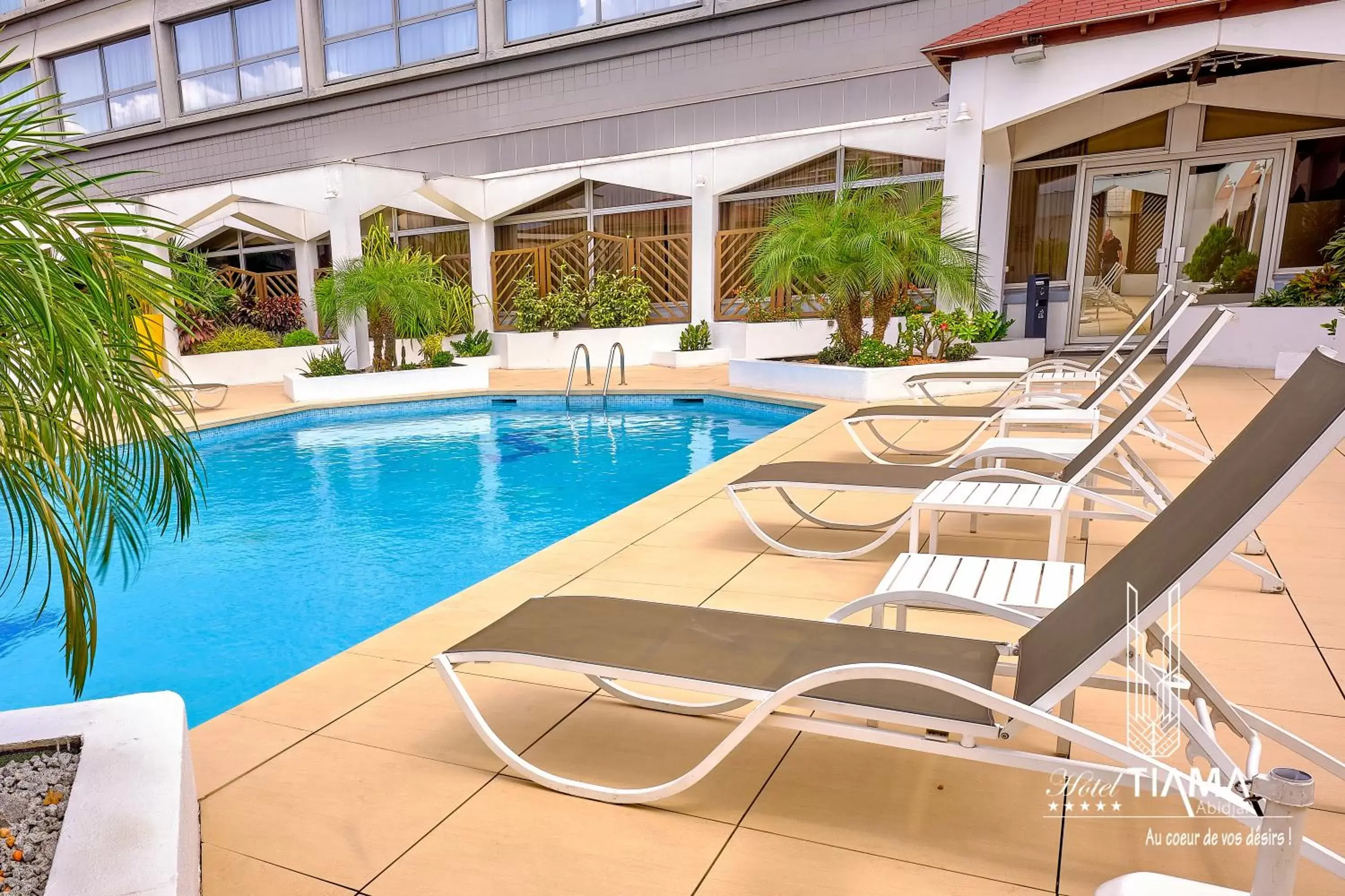 Facade/entrance, Swimming Pool in Hotel Tiama Abidjan
