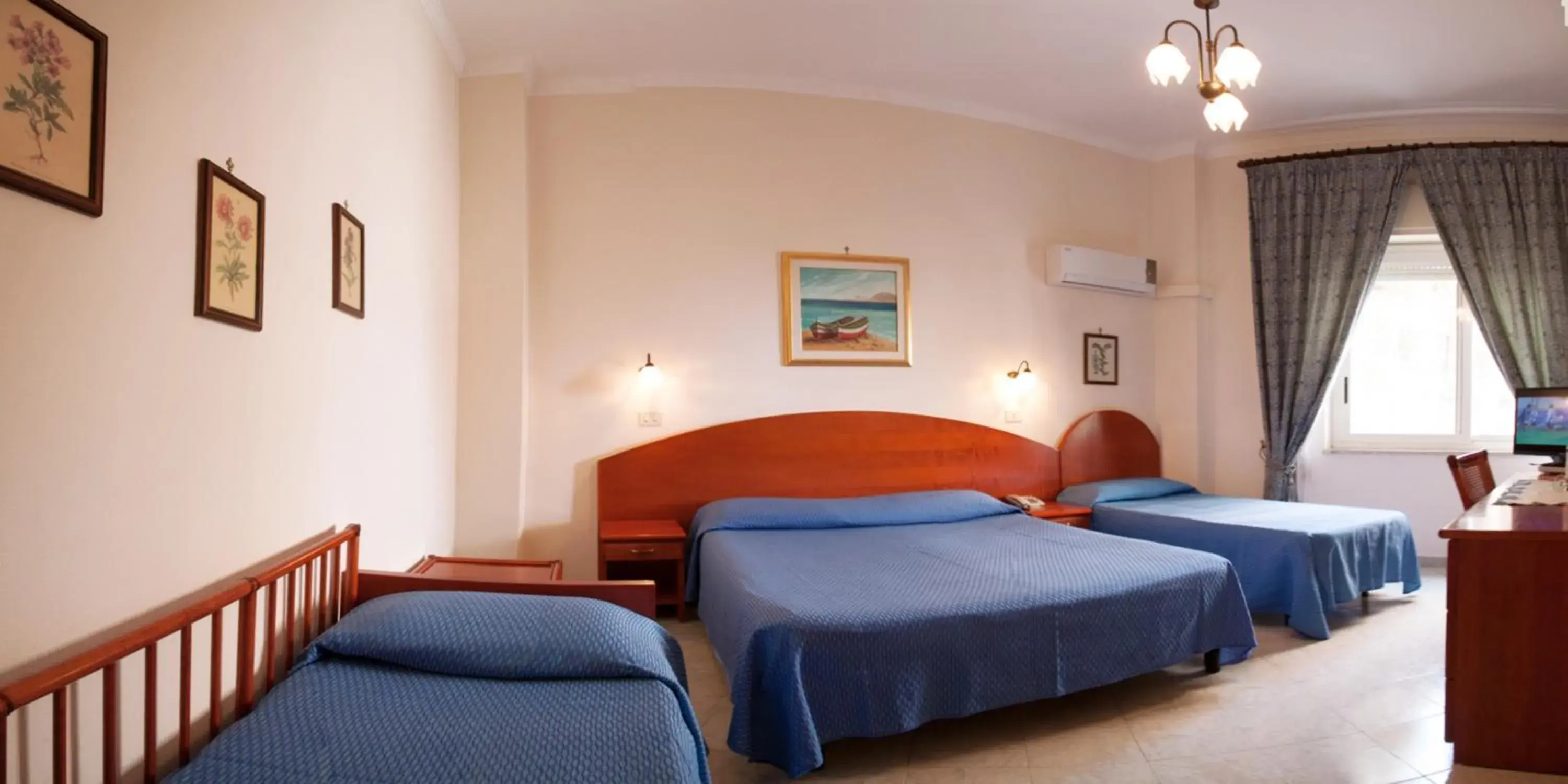 Bed in Hotel Mediterraneo