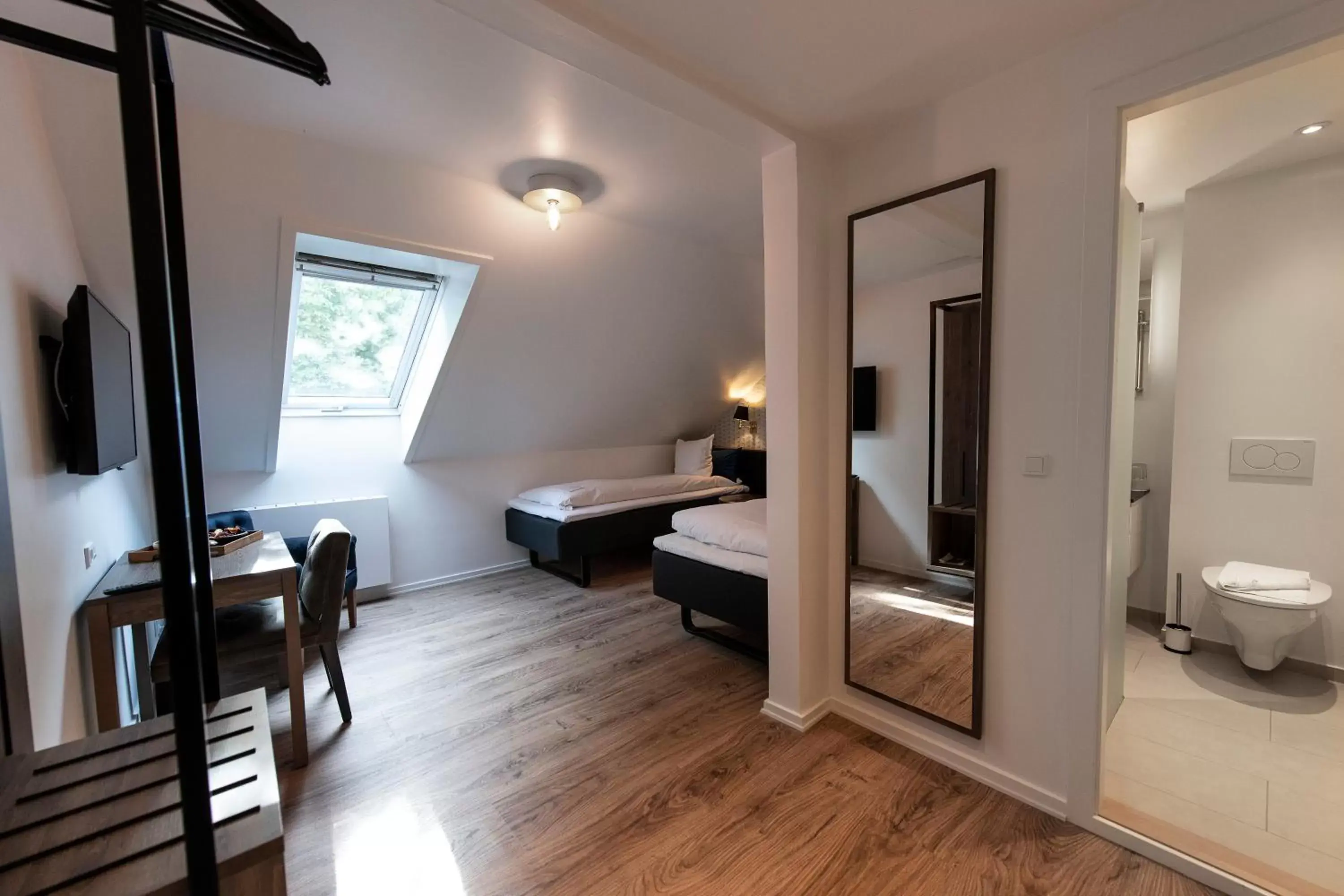 Bedroom, Seating Area in Hotel Scheelsminde