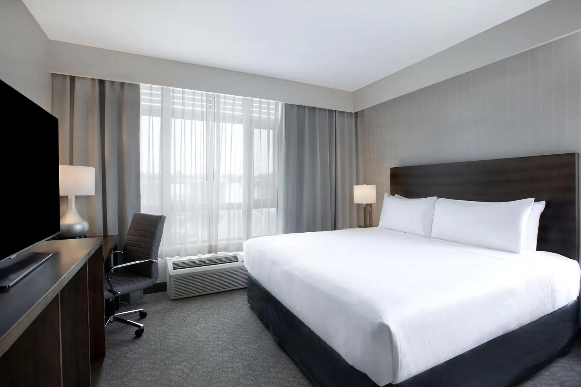 Bed in Great Blue Heron Hotel