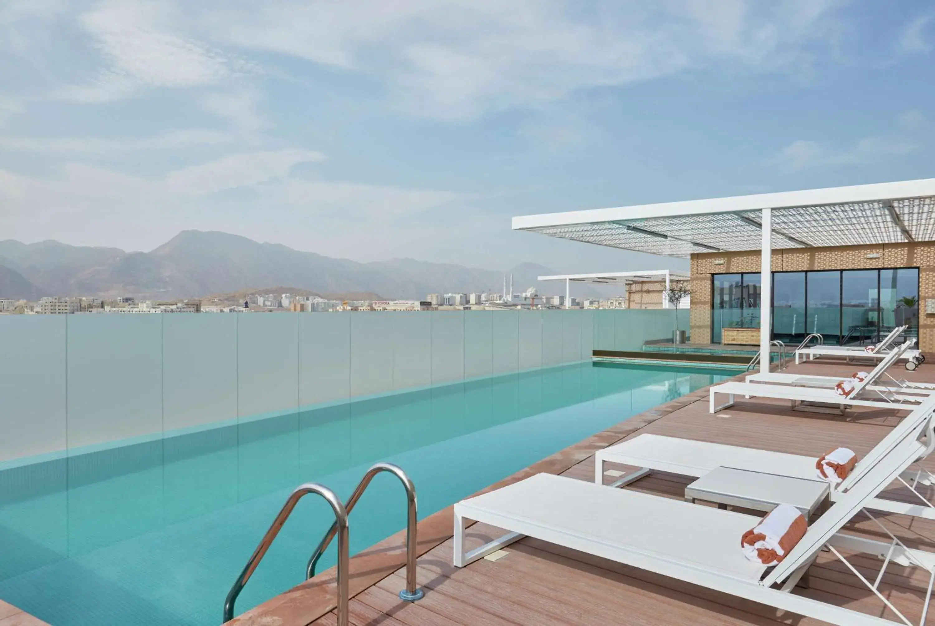 Pool view, Swimming Pool in Hilton Garden Inn Muscat Al Khuwair