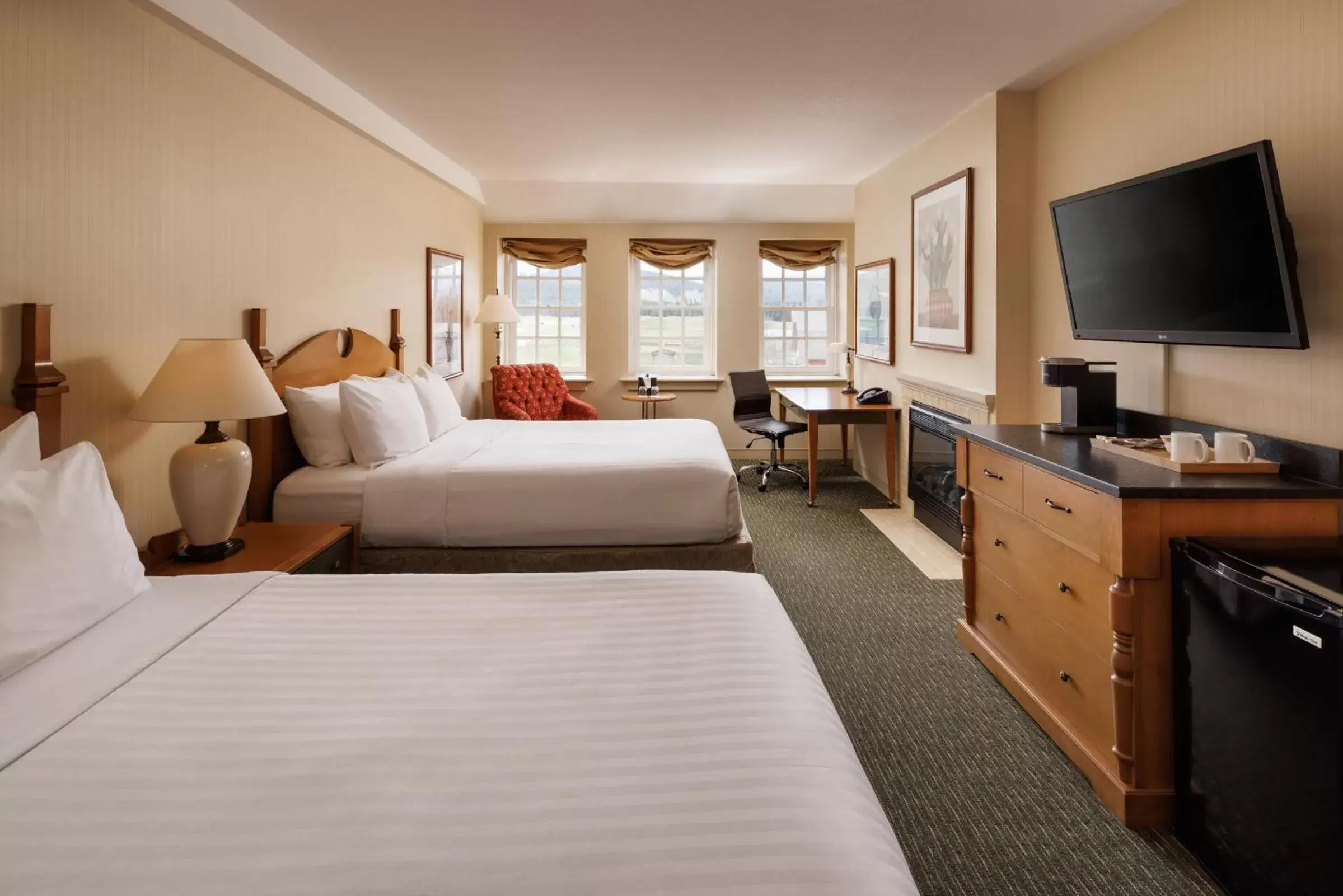 Bed, TV/Entertainment Center in St. Eugene Golf Resort & Casino