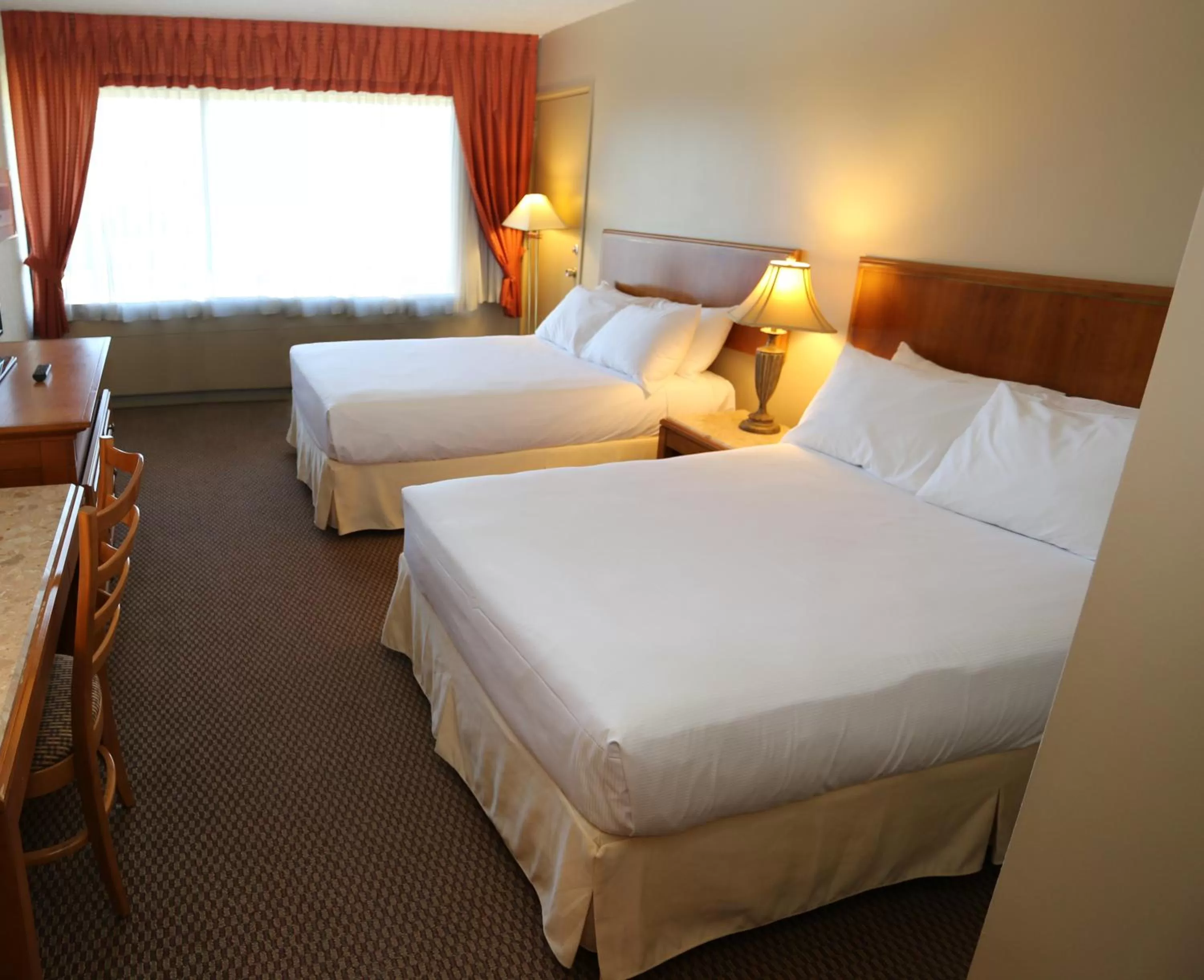 Bed in Hôtels Gouverneur Montréal - Île Charron