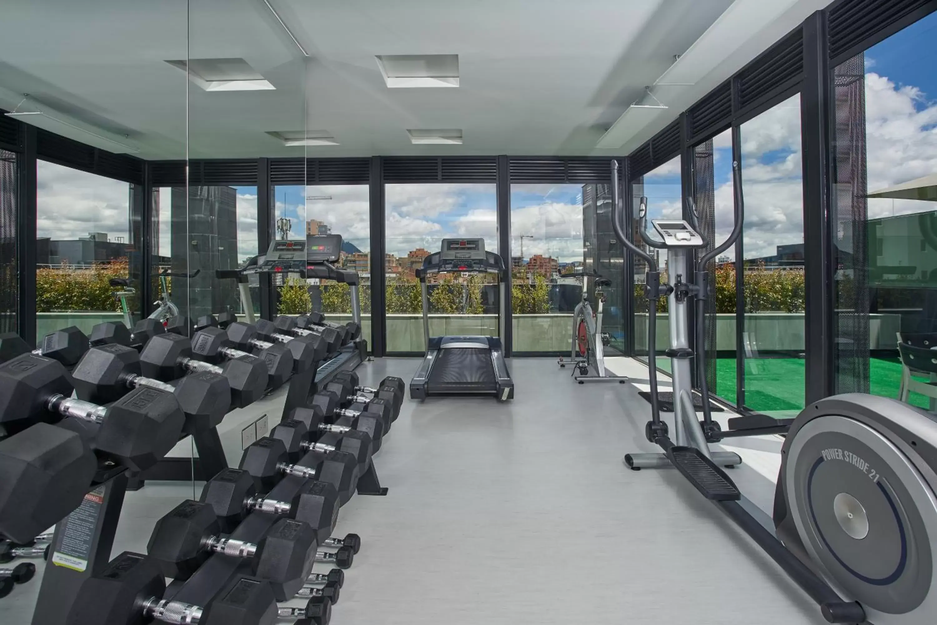 Fitness centre/facilities, Fitness Center/Facilities in Hotel 100 Luxury Suites by Preferred