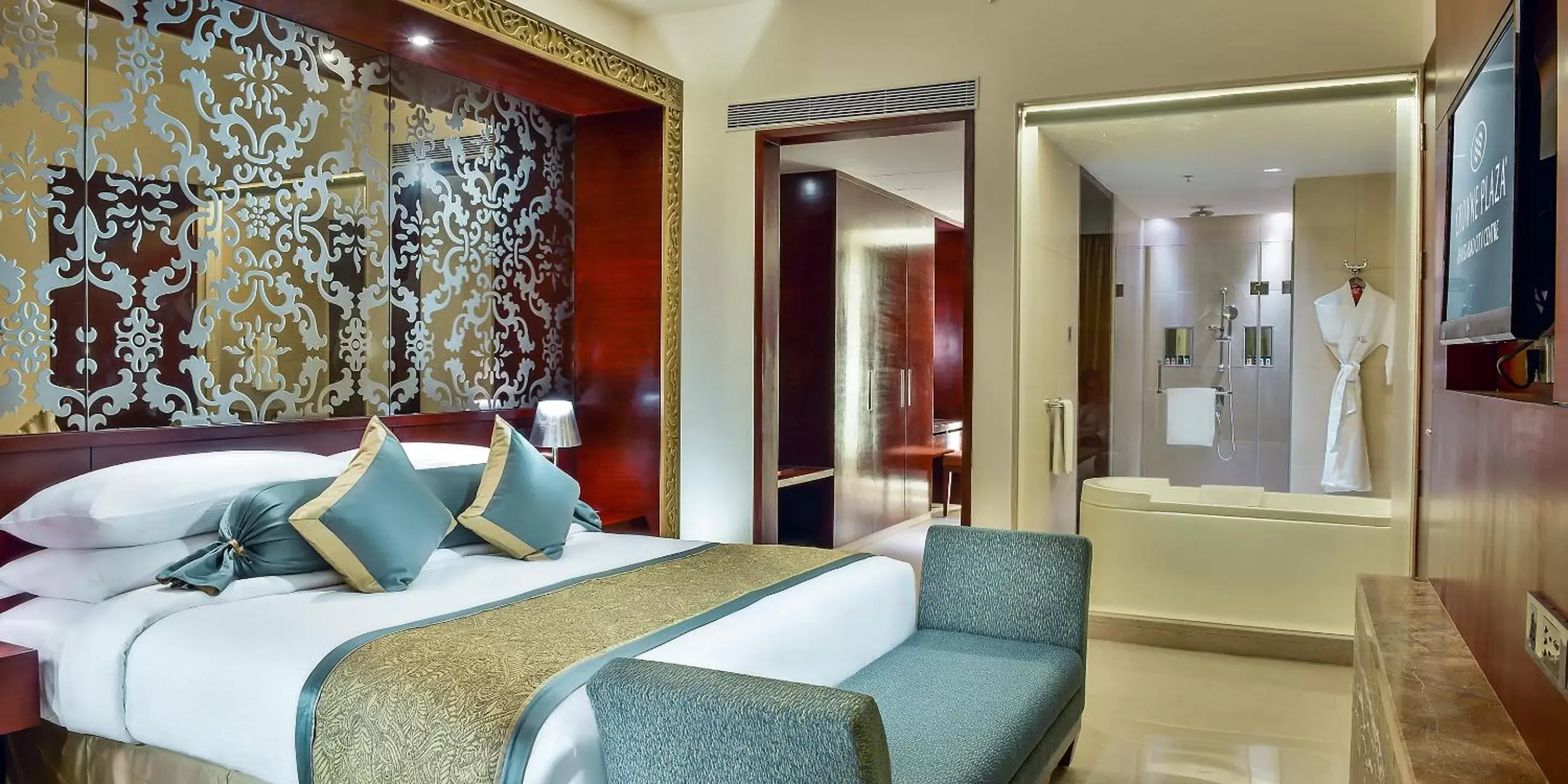 Bathroom, Bed in Crowne Plaza Ahmedabad City Centre, an IHG Hotel