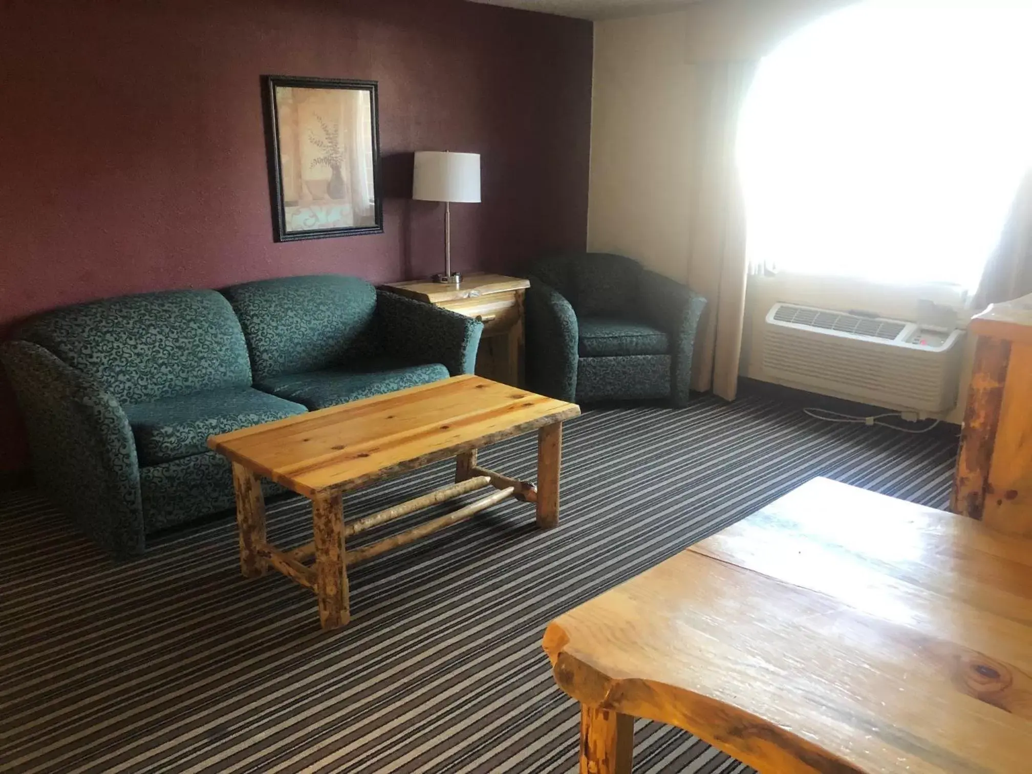 Living room, Seating Area in Ramada by Wyndham Butte