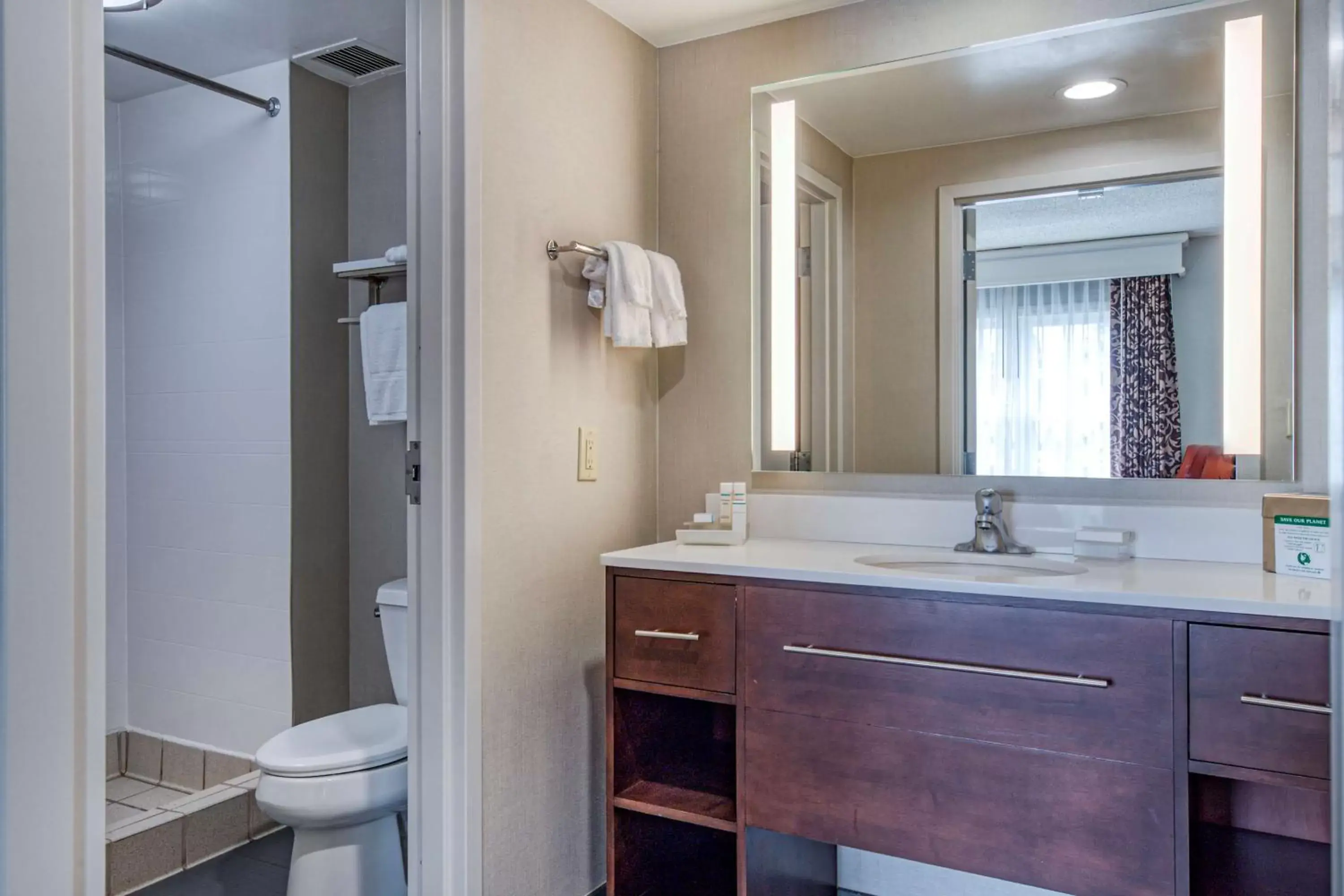 Bathroom in Homewood Suites by Hilton Olmsted Village