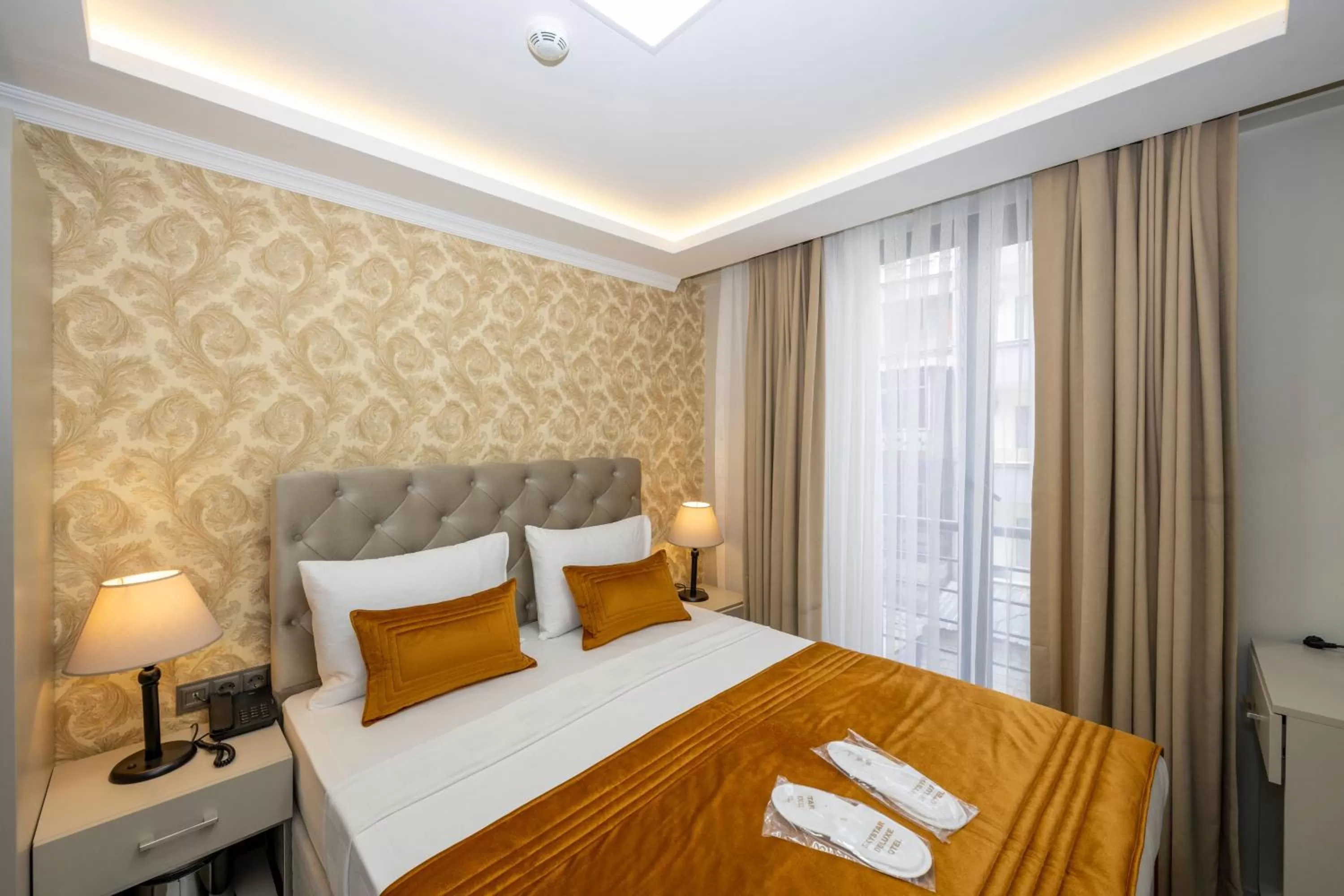 Bed in SKYSTAR DELUXE HOTEL