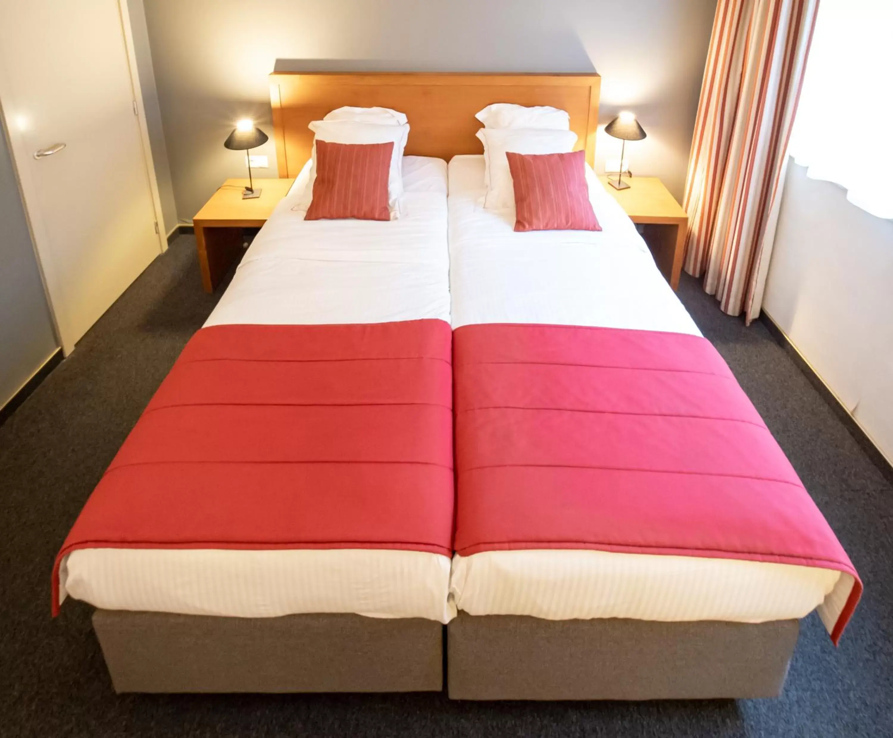 Bed in Ghent River Hotel
