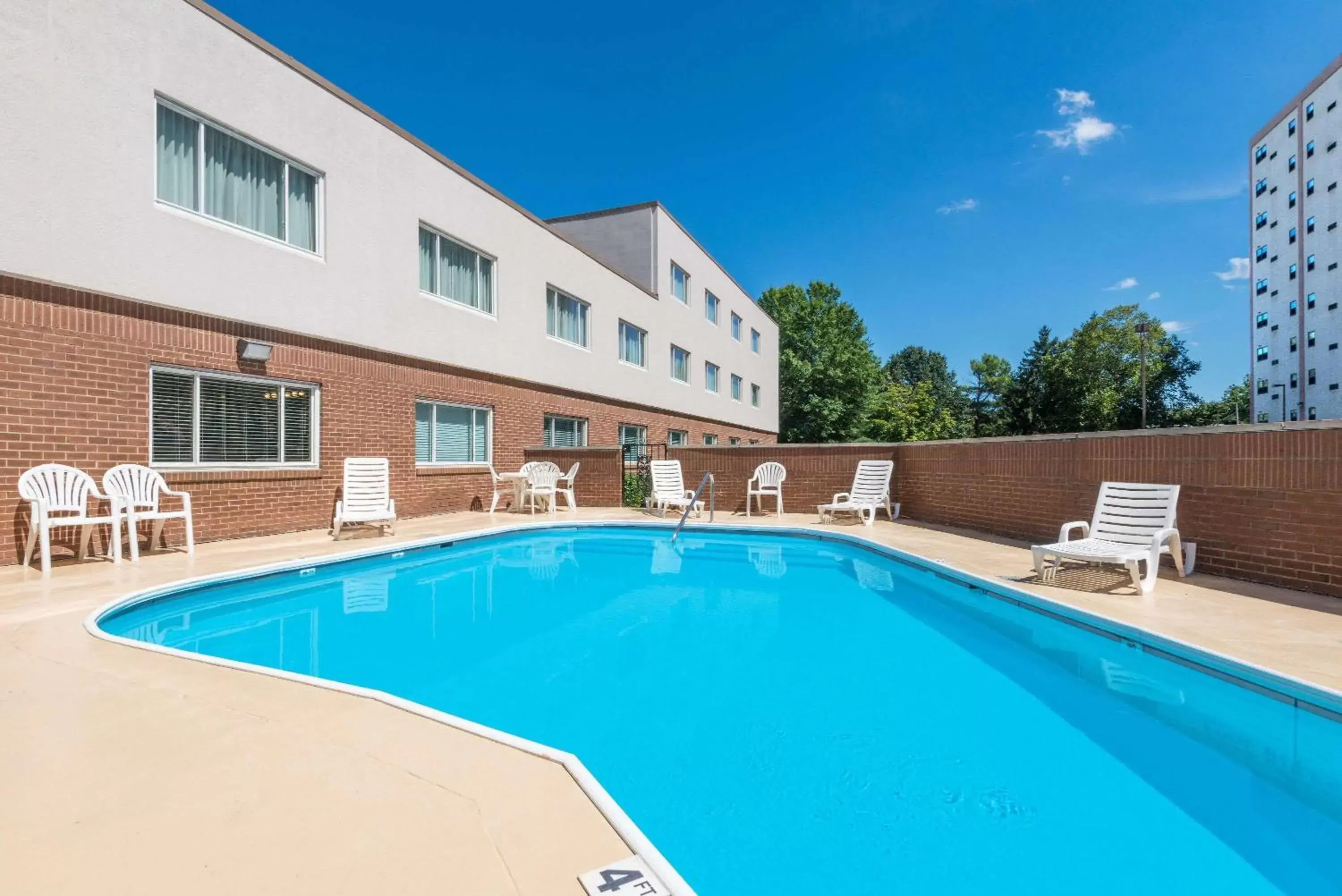 On site, Swimming Pool in Ramada by Wyndham Paintsville Hotel & Conference Center