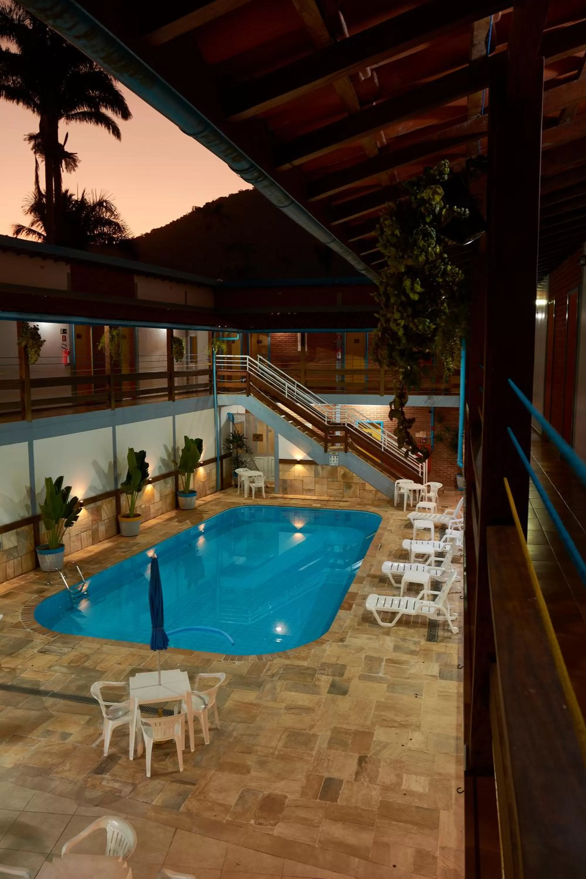Swimming pool in Hotel e Pousada Pouso54