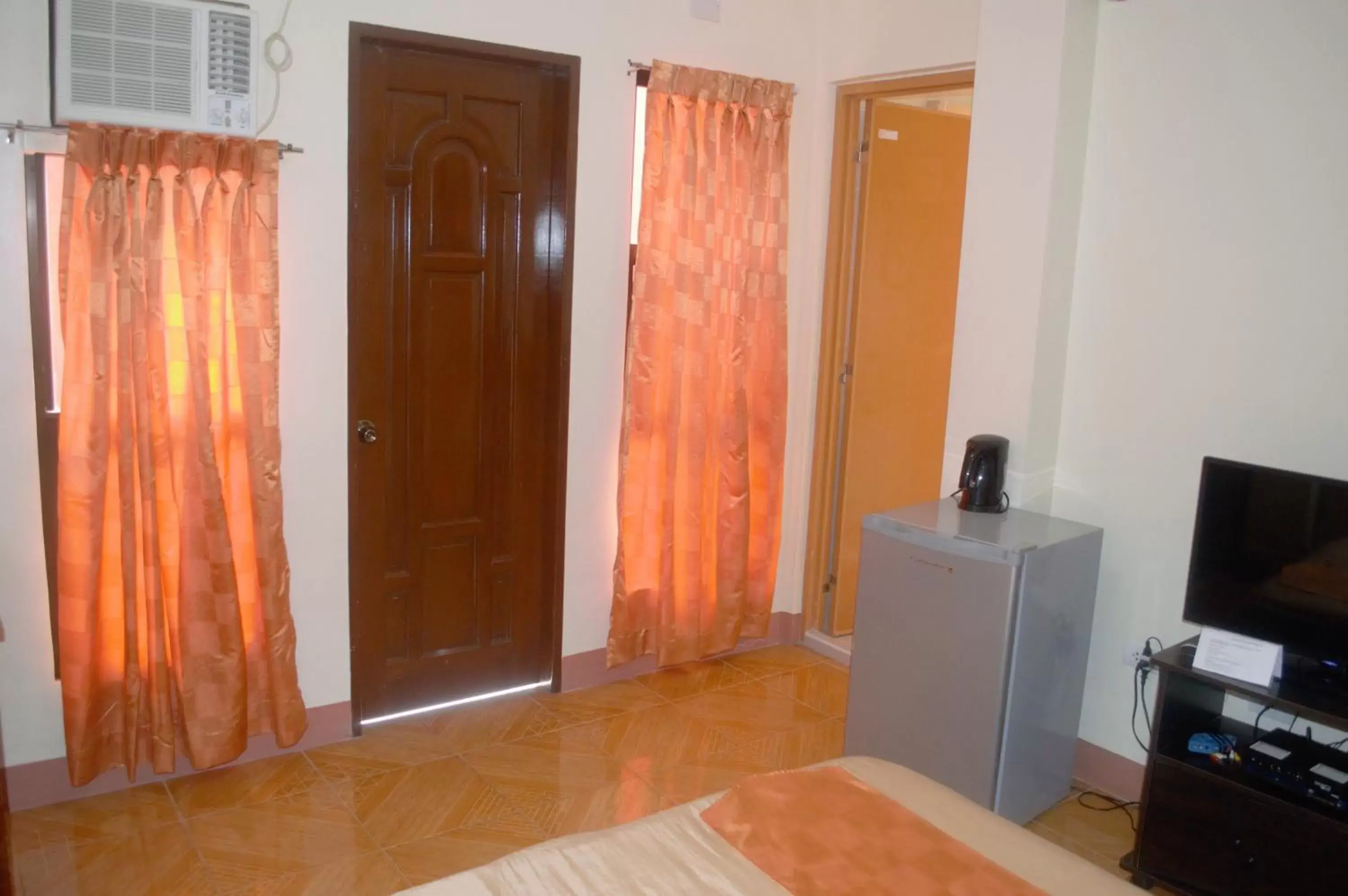 Bed, TV/Entertainment Center in Manora Apartment