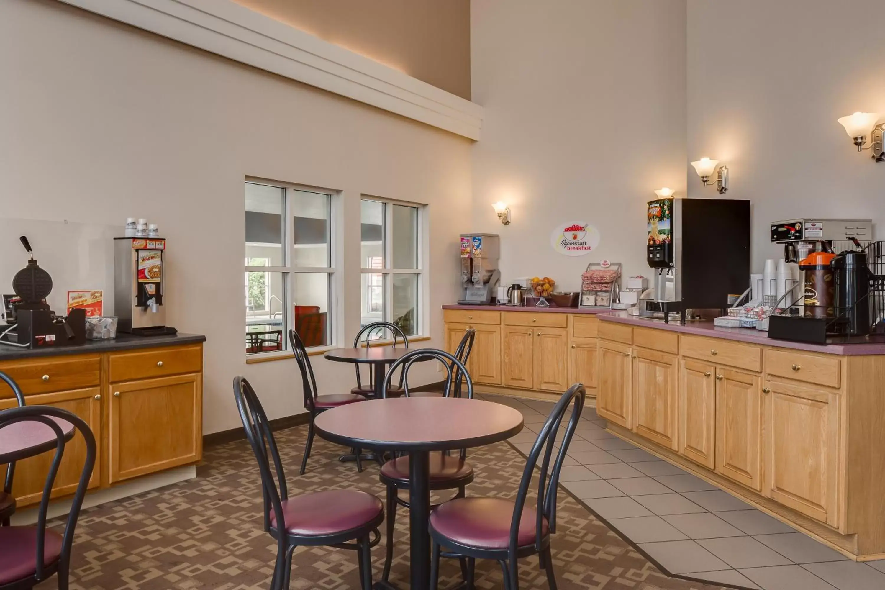 Lobby or reception, Restaurant/Places to Eat in Super 8 by Wyndham Menomonie WI