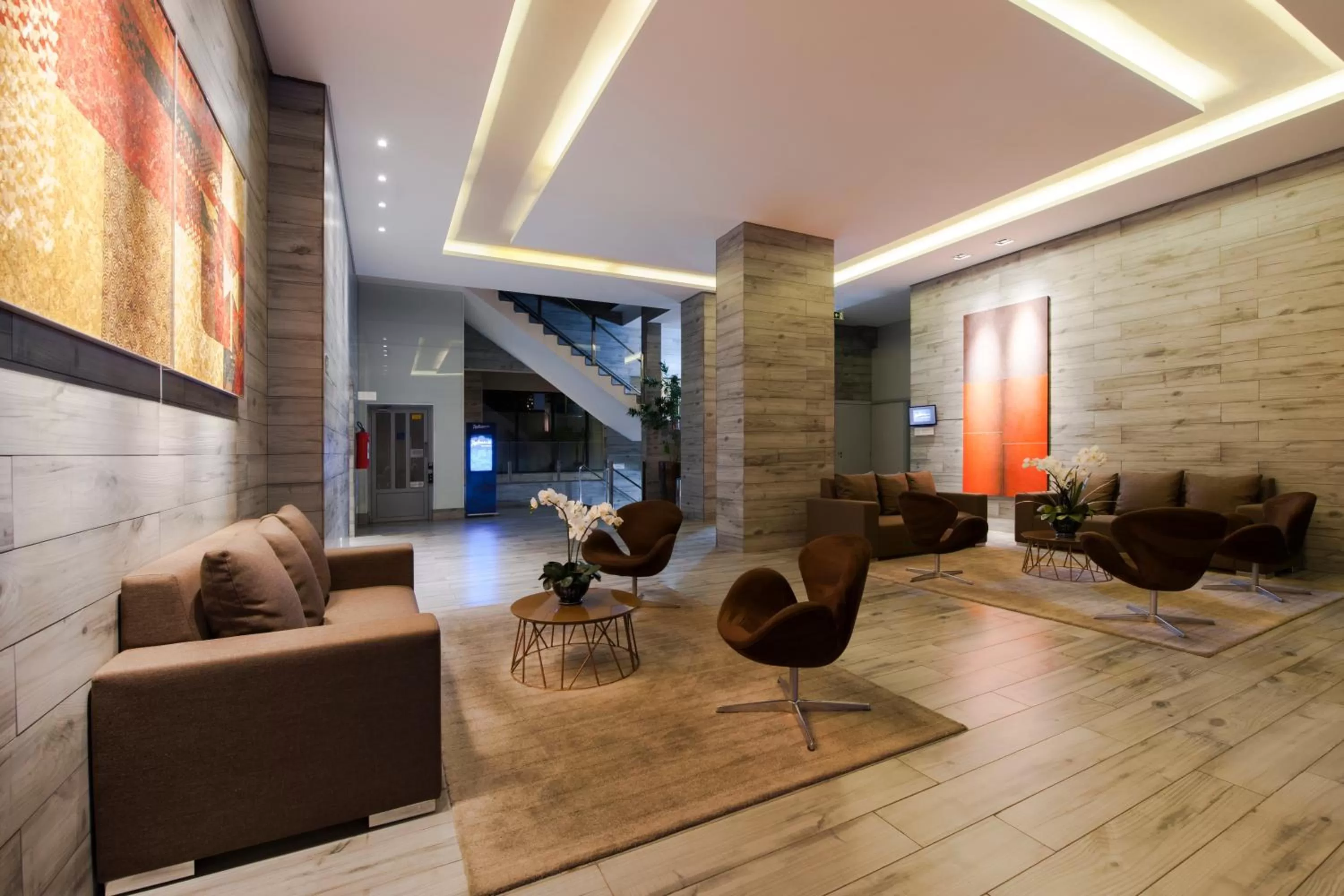 Communal lounge/ TV room in Radisson Blu Belo Horizonte Savassi