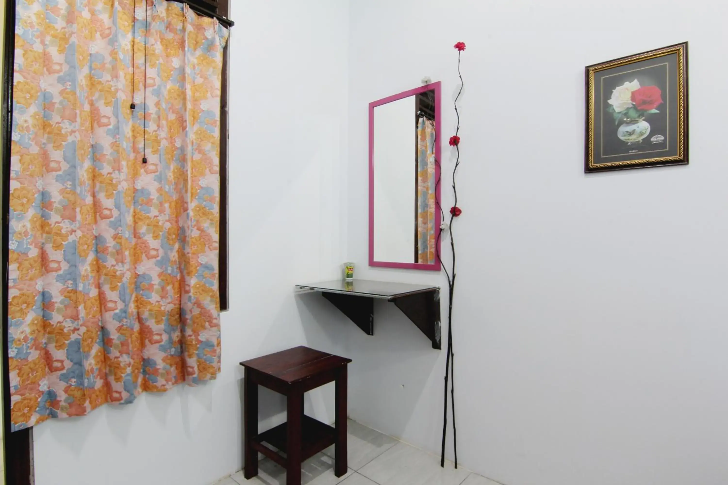 Bedroom, TV/Entertainment Center in Tiga Dua Homestay