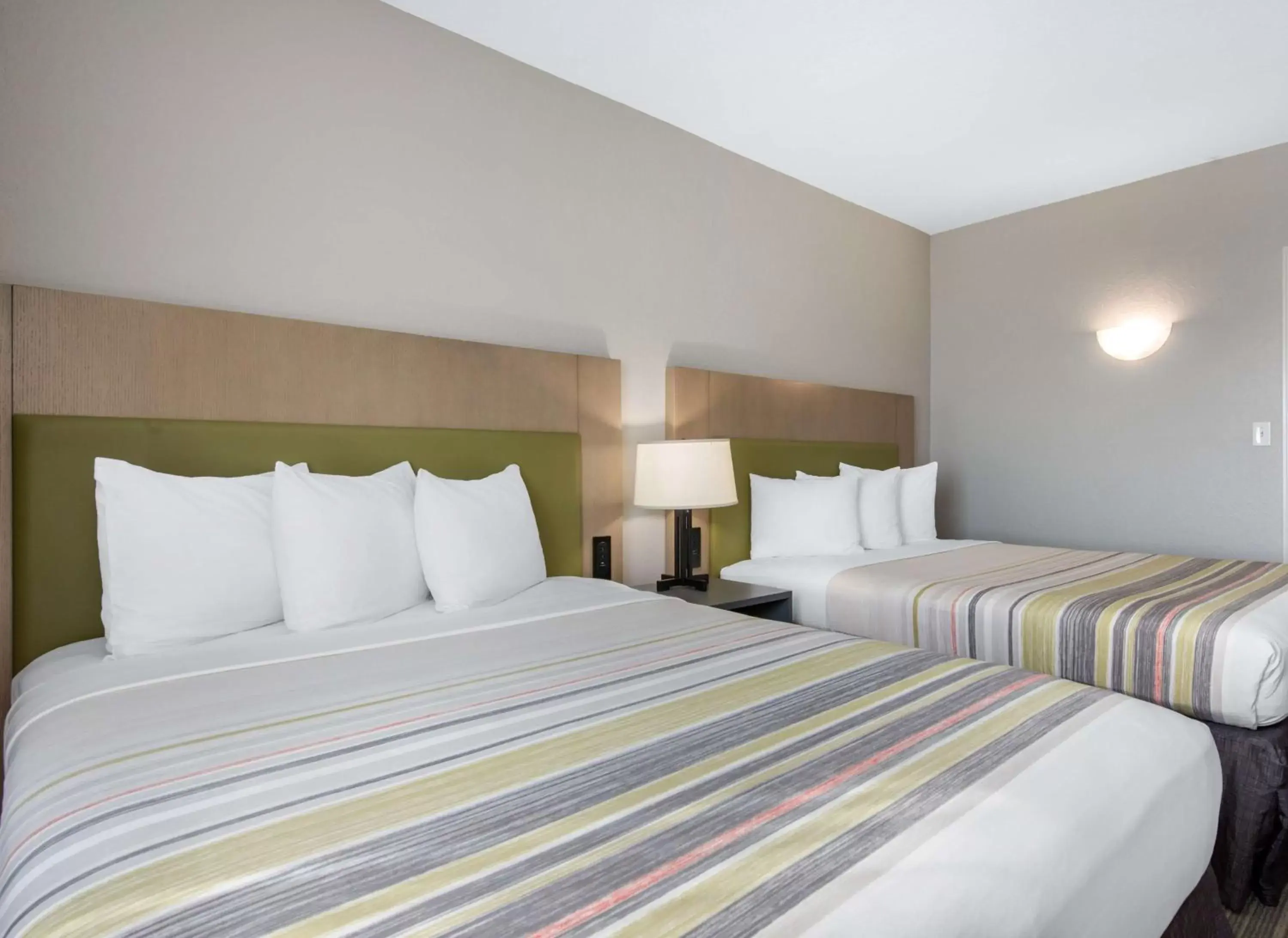 Bed in Country Inn & Suites by Radisson, Port Canaveral, FL