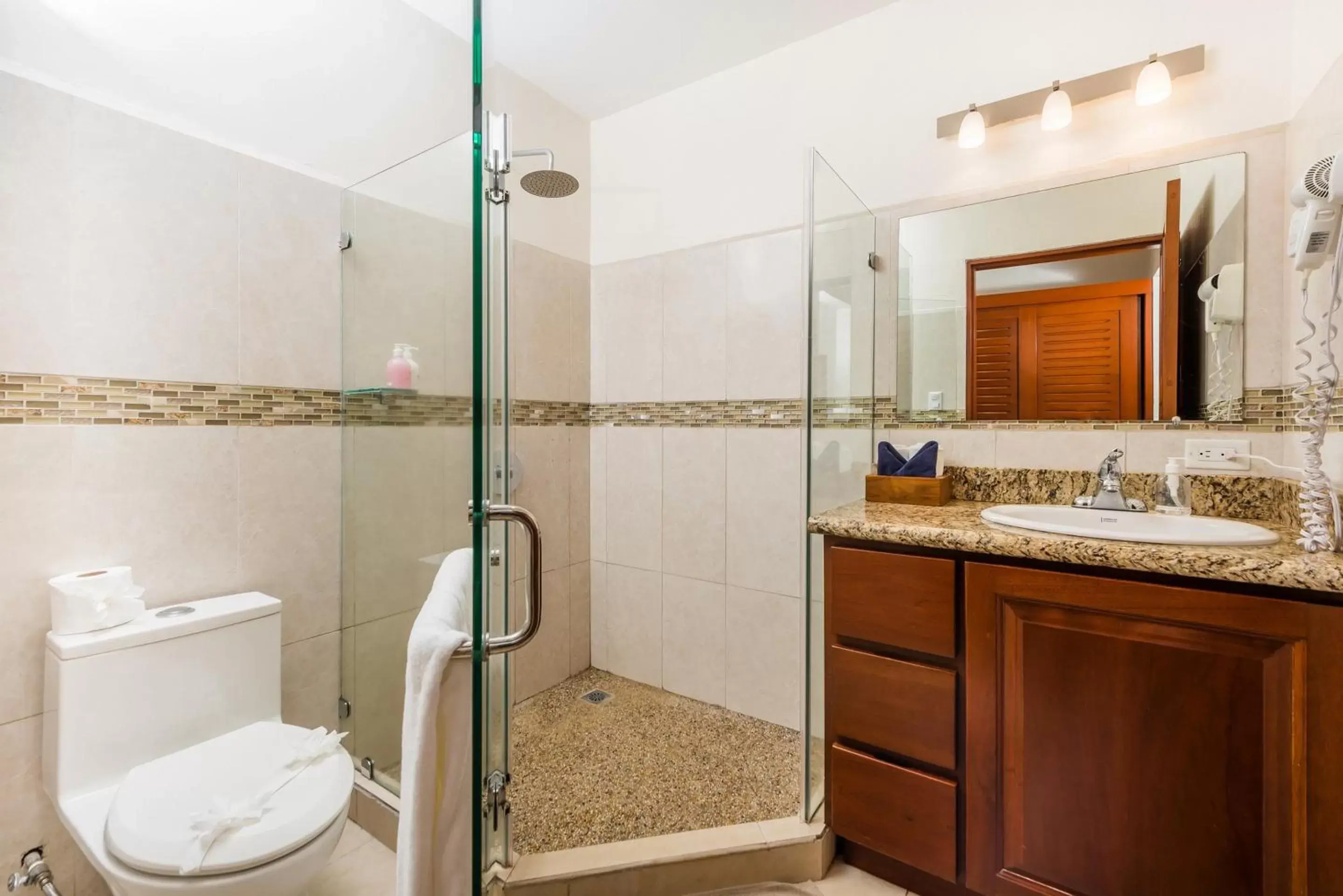Shower, Bathroom in The Coast Beachfront Hotel