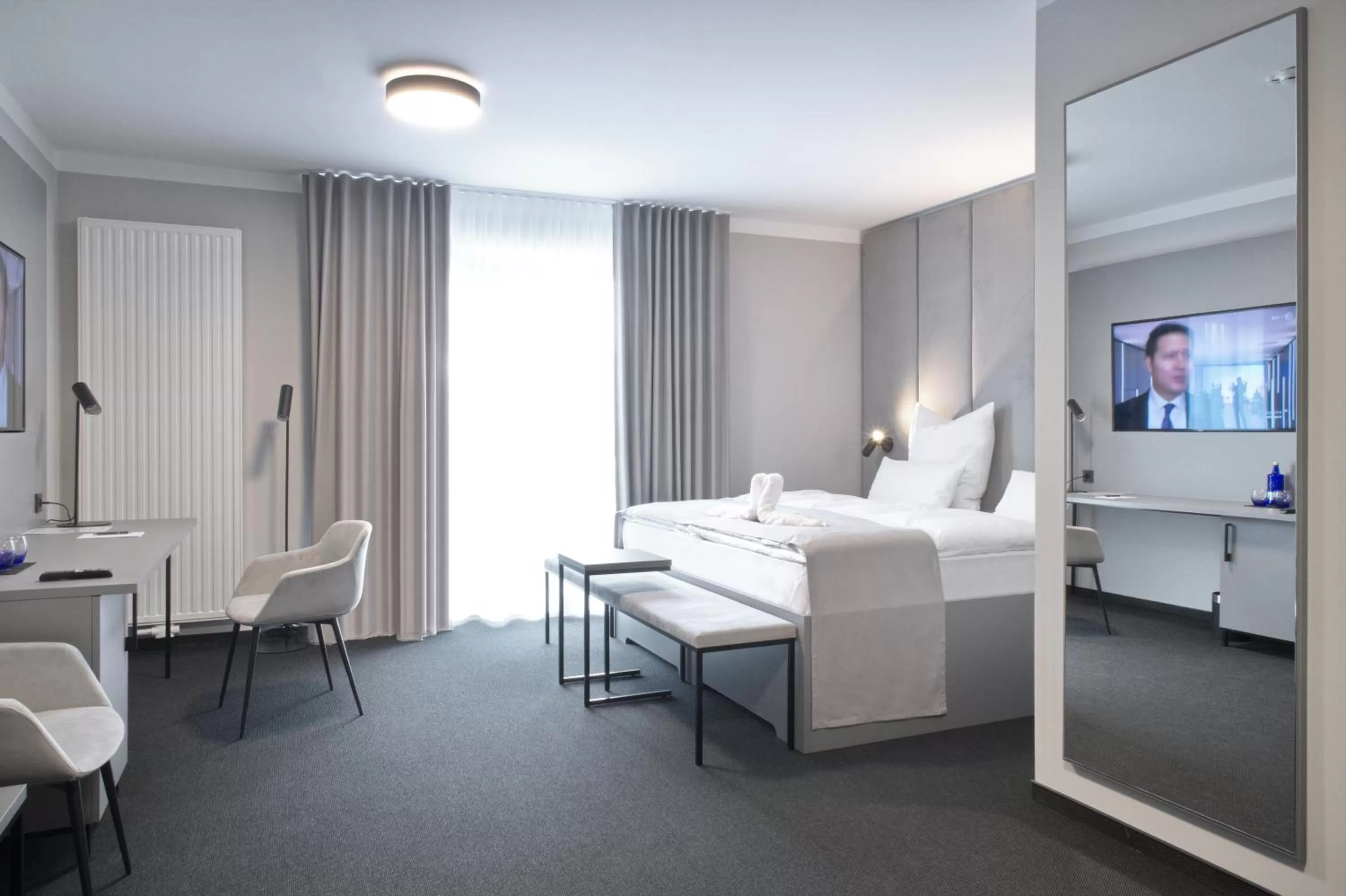 Seating area, Bed in Hotel Adler Münster