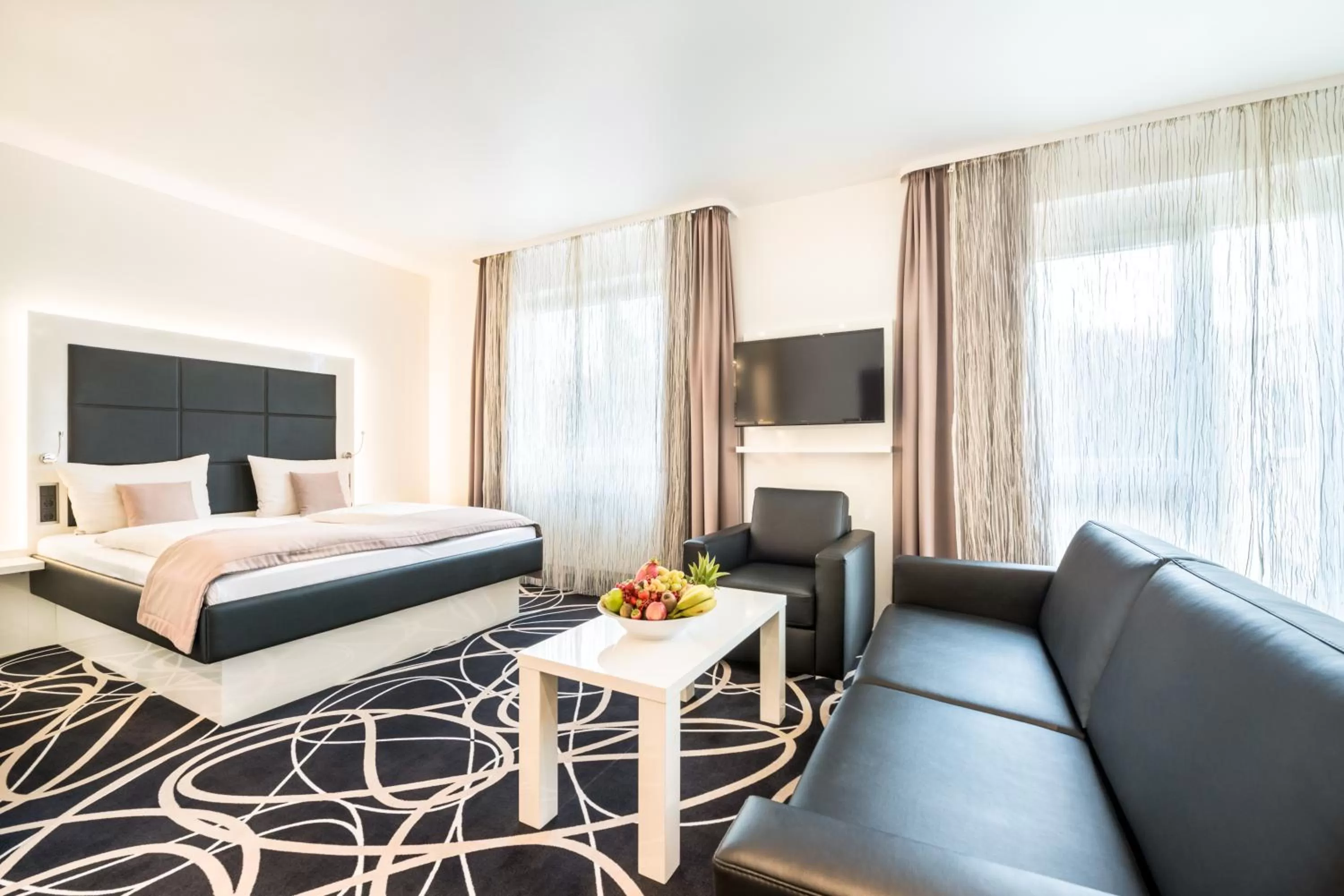 Seating area, Bed in Sieben Welten Hotel & Spa Resort