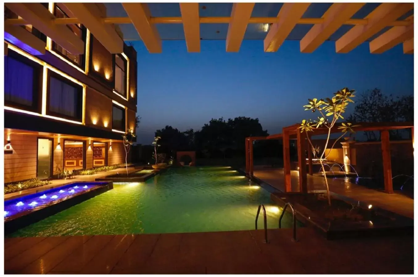 Swimming Pool in Ramada by Wyndham Varanasi Katesar