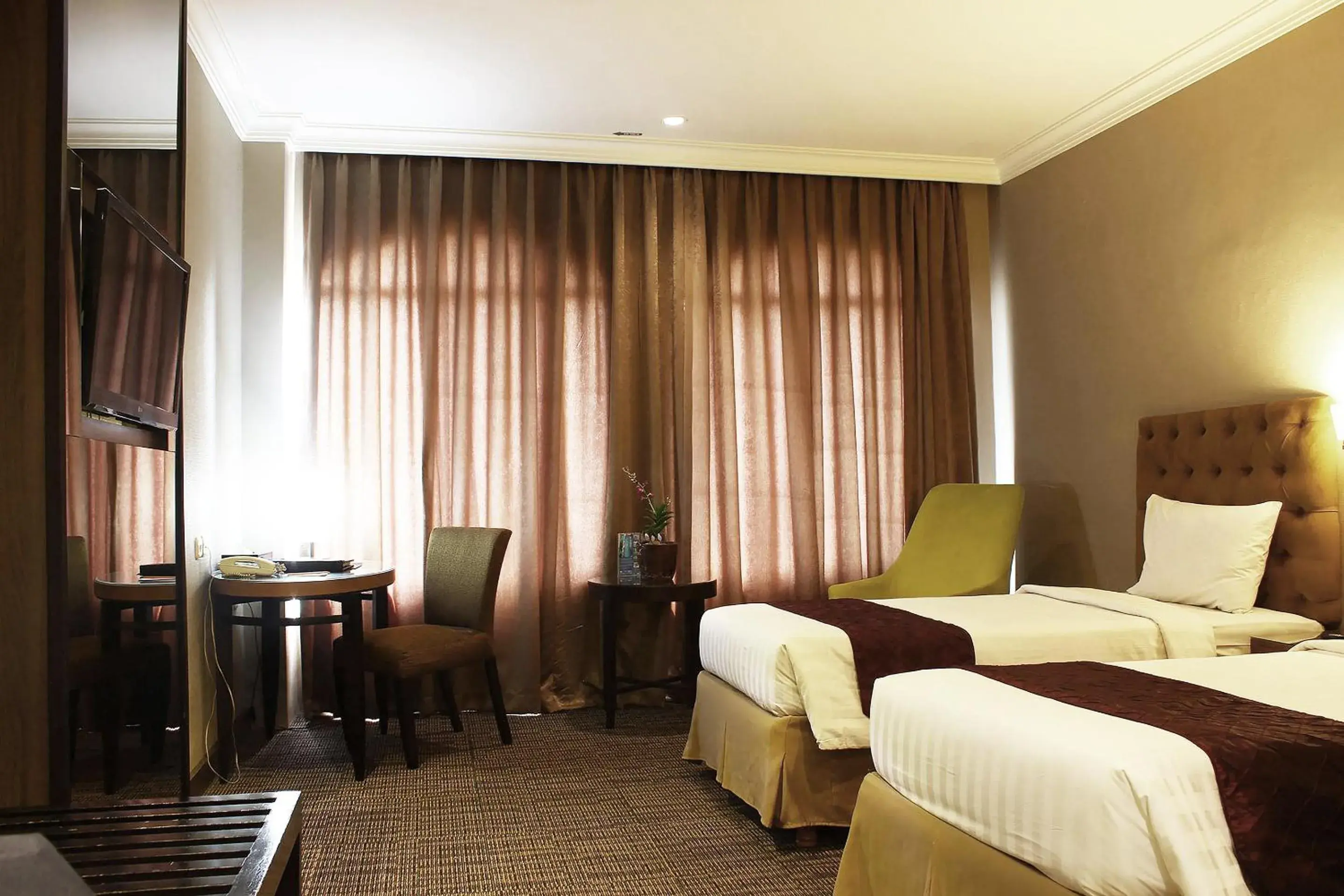 Photo of the whole room, Bed in The Mirah Bogor Hotel