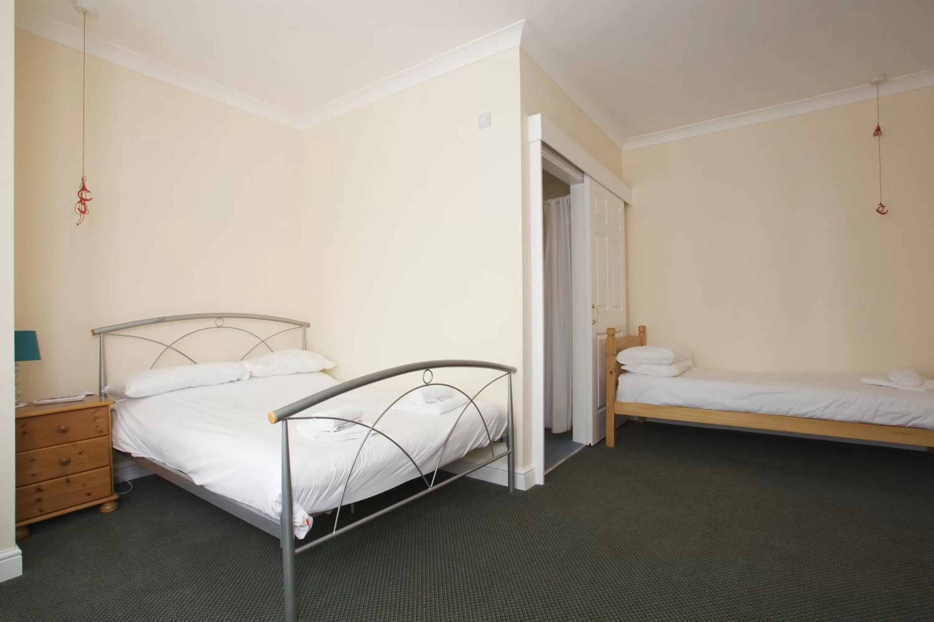 Bedroom in All Seasons Lodge Hotel