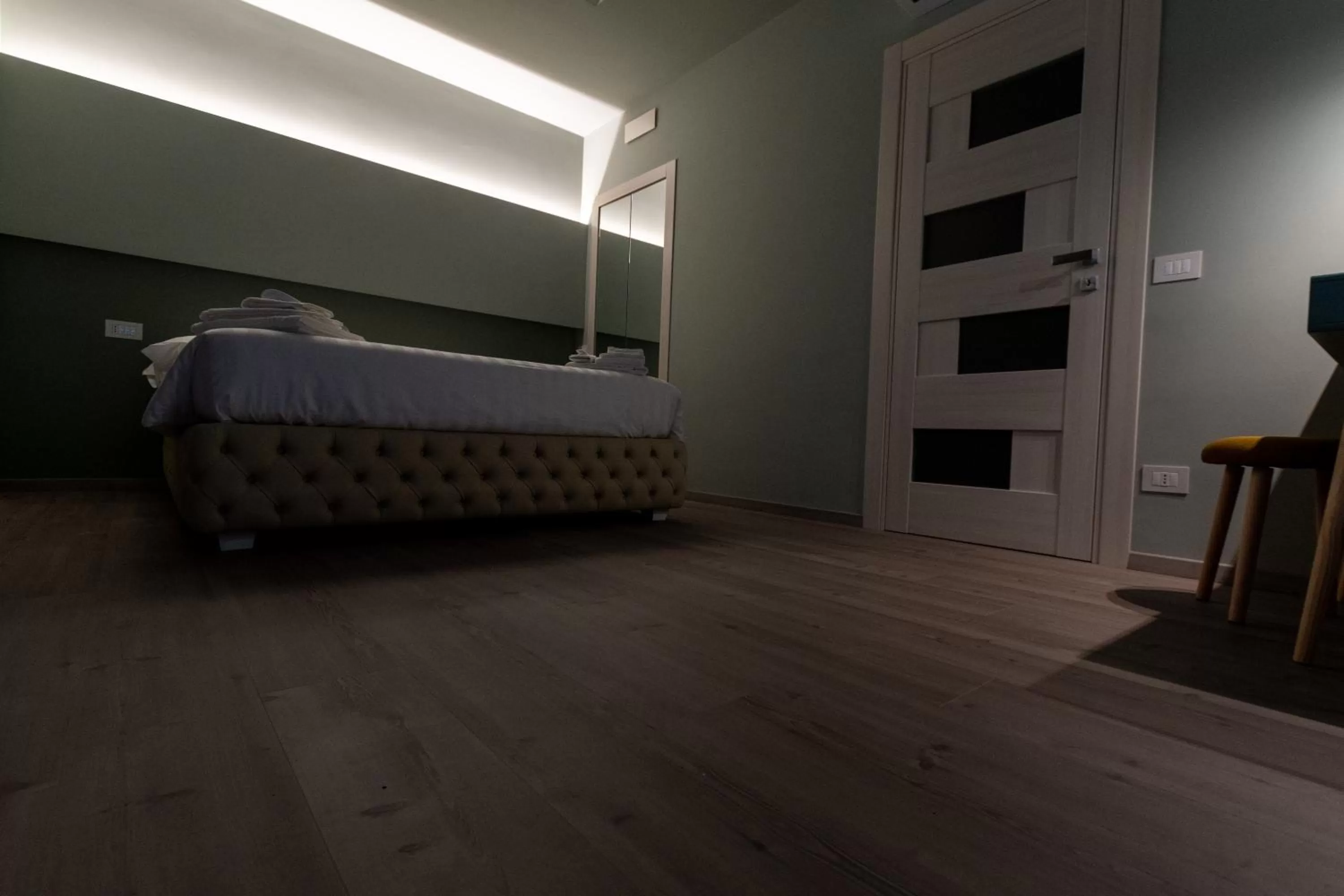 Bed in DiVino Rooms Deluxe